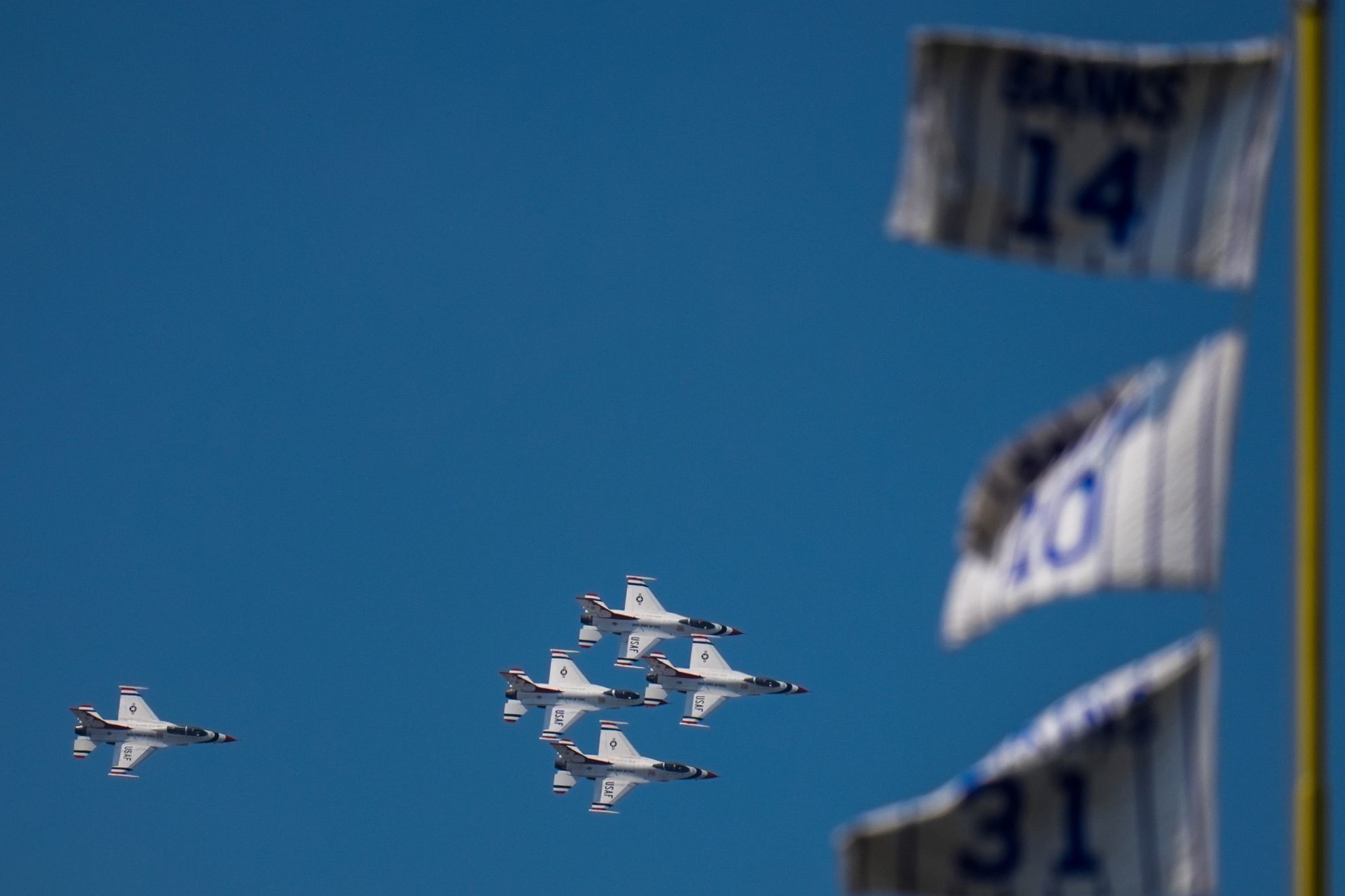 Chicago Cubs players and fans get the fright of their lives when military jets fly over them during a game