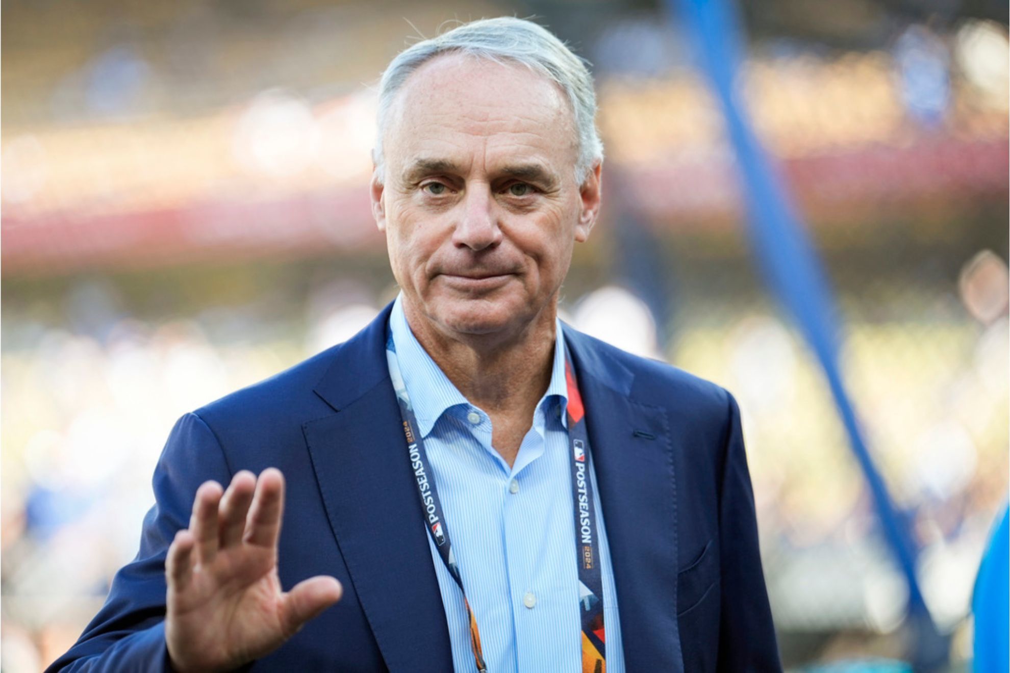 Commissioner of Major League Baseball, Rob Manfred walks on the field
