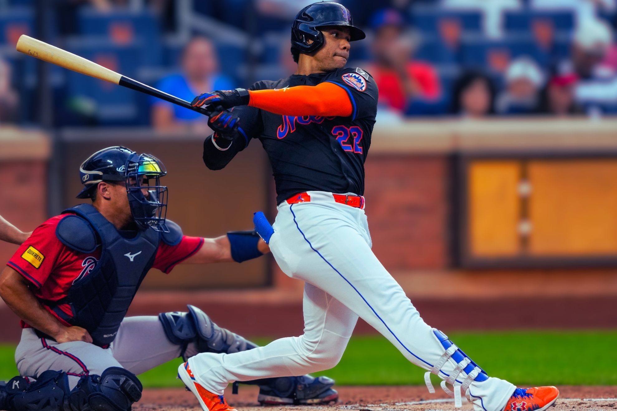 New York Mets' Juan Soto (22) hits a single during the first inning of a baseball game