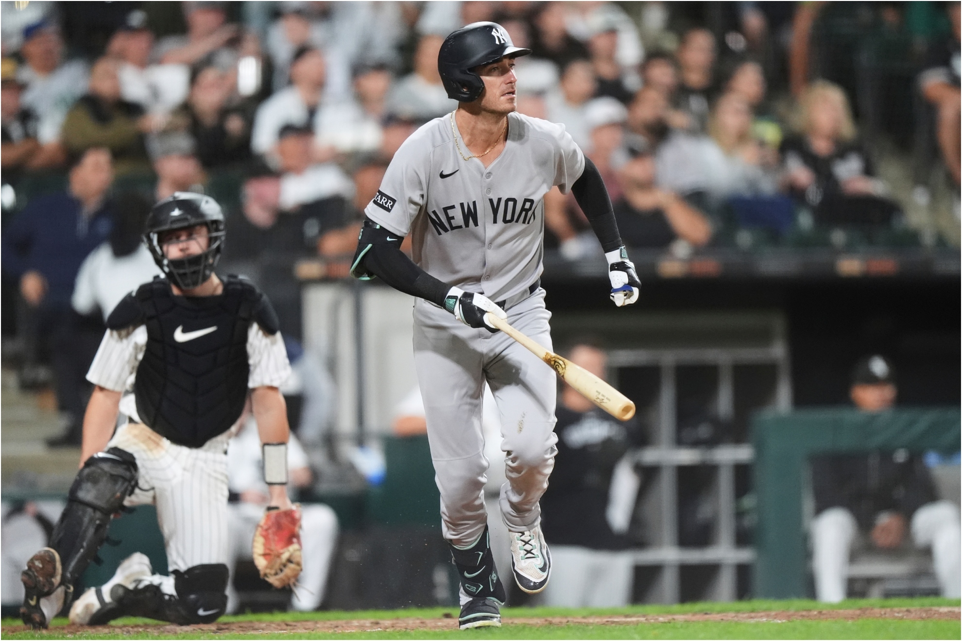 New York Yankees' Cody Bellinger watches after hitting a double.