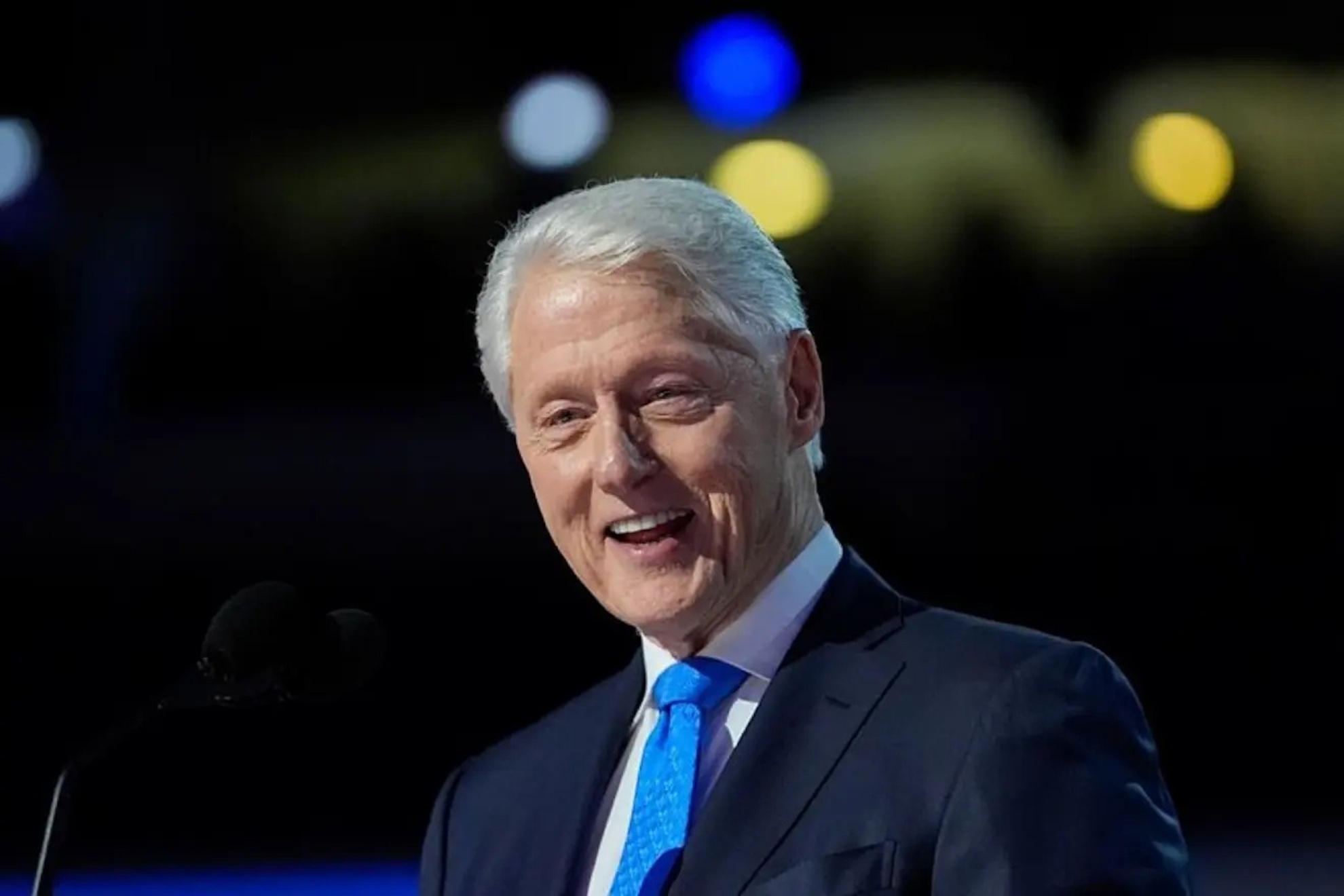 Concerns for Bill Clinton's health as he is seen with a portable defibrillator alongside his wife at Hamptons airport