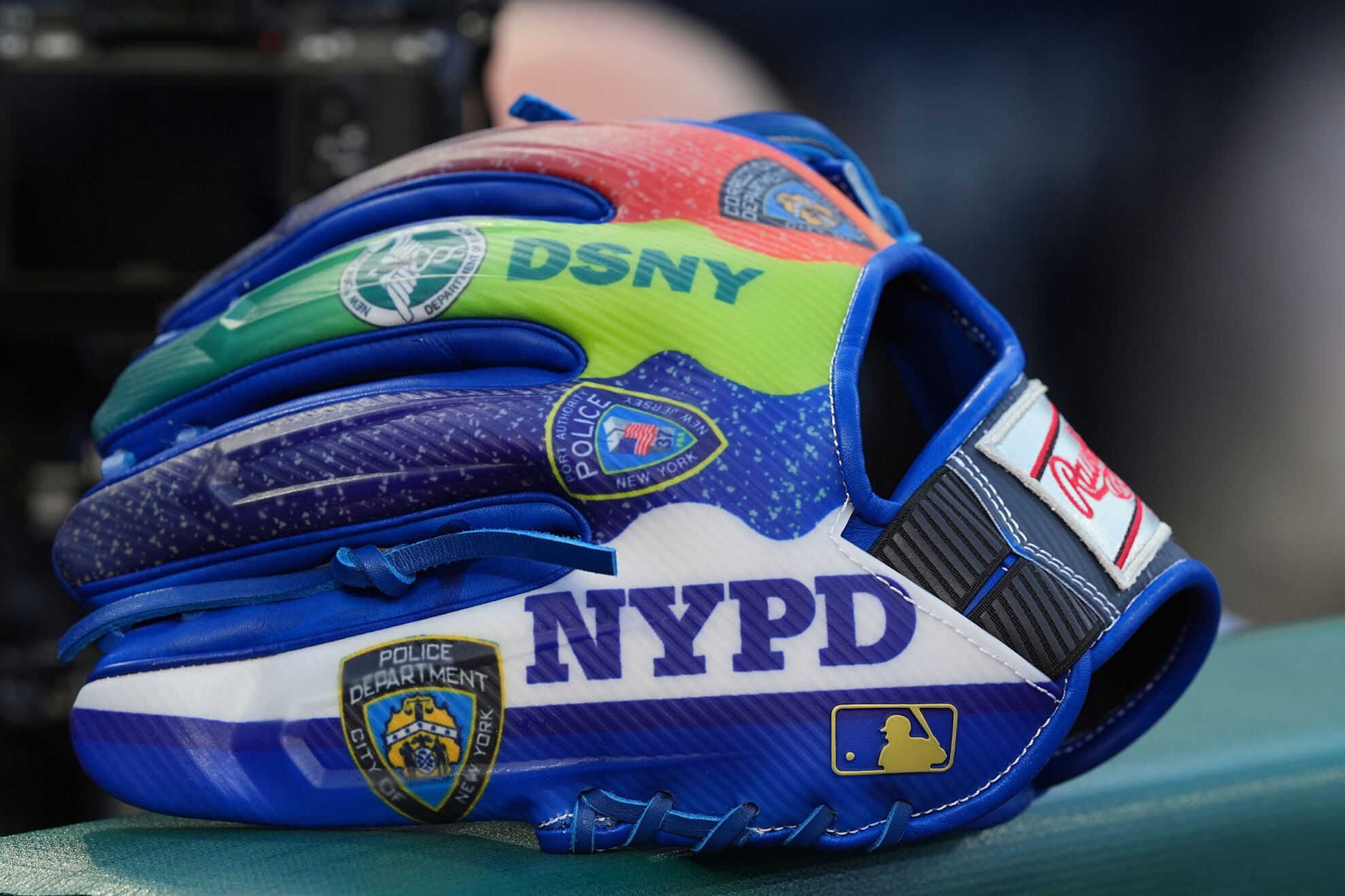 New York Mets shortstop Francisco Lindor's glove sits on the dugout railing ahead of a baseball game against the Philadelphia Phillies, Thursday, Sept. 11, 2025, in Philadelphia.