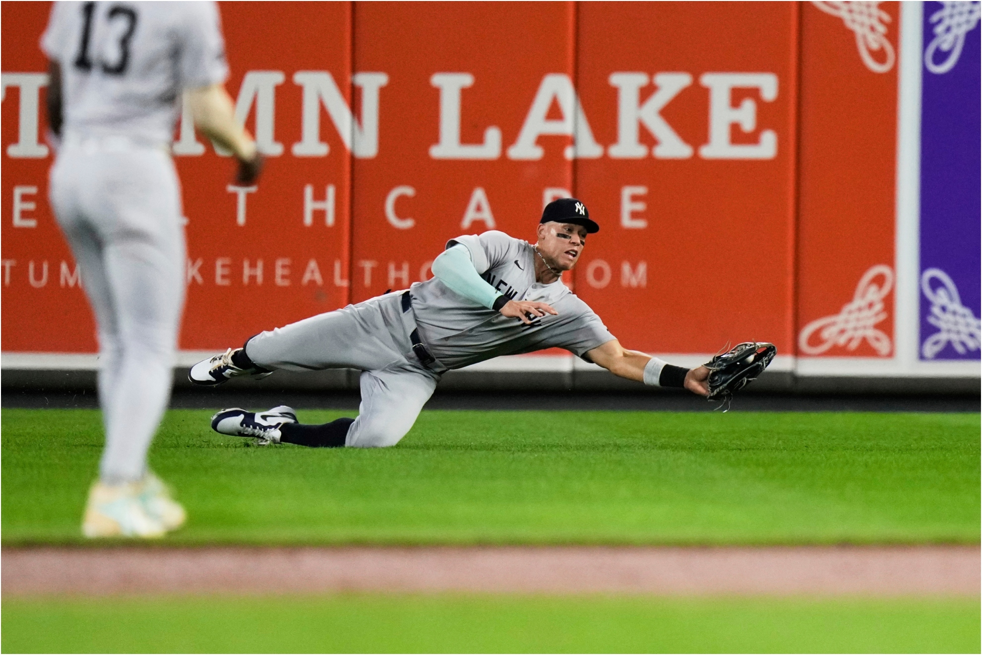 New York Yankees right fielder Aaron Judge catches a a ball hit by Baltimore Orioles' Jordan Westburg,
