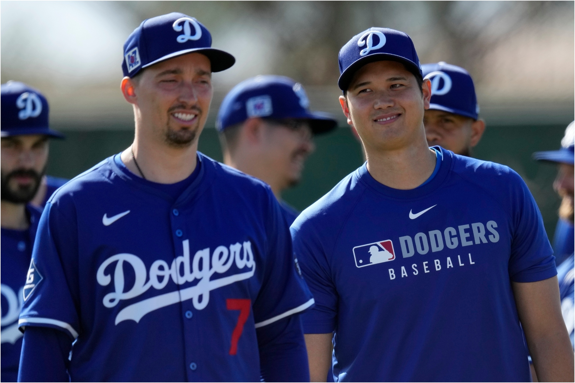 Los Angeles Dodgers' Shohei Ohtani, of Japan, right, and Blake Snell run drills.