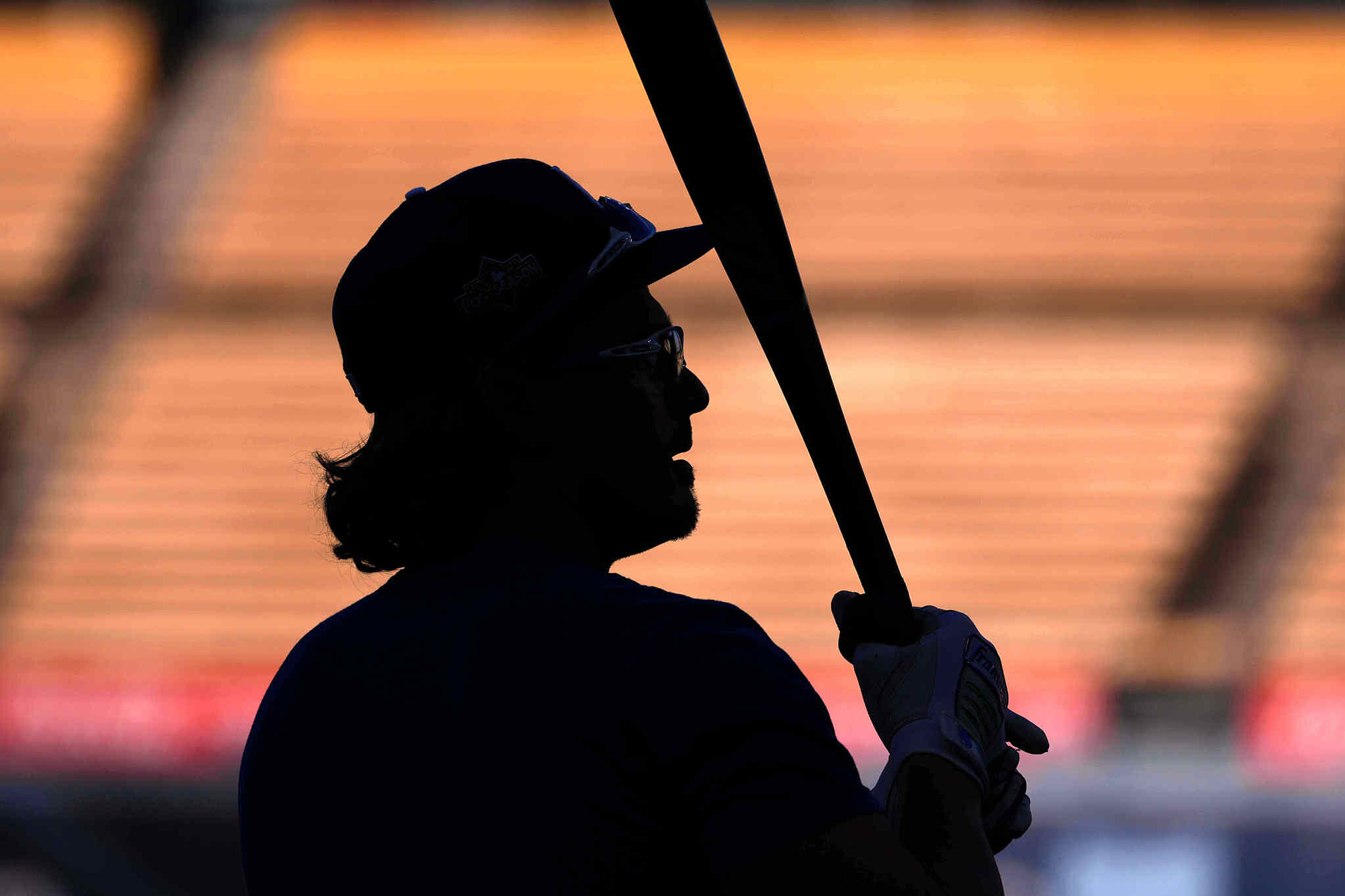 Los Angeles Dodgers' Kiké Hernández warms up during practice ahead of Game 3 of baseball's National League Championship Series against the Milwaukee Brewers, Wednesday, Oct. 15, 2025, in Los Angeles.