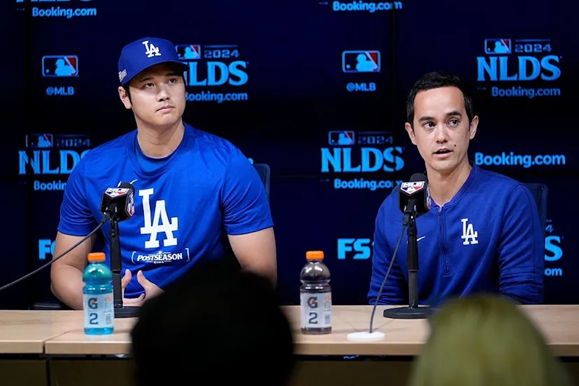 Shohei Ohtani at a press conference with his interpreter Will Ireton.