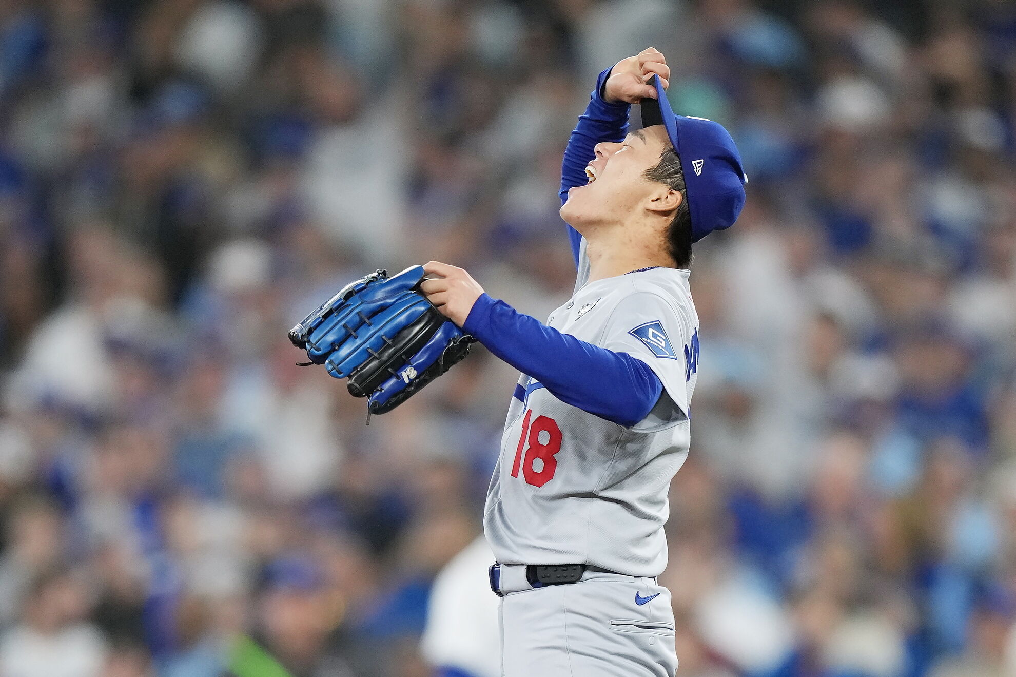 Los Angeles Dodgers pitcher Yoshinobu lt;HIT gt;Yamamoto lt;/HIT gt; celebrates after the Dodgers defeated the Toronto Blue Jays in Game 7 of baseball's World Series, Sunday, Nov. 2, 2025, in Toronto. (Nathan Denette/The Canadian Press via AP)