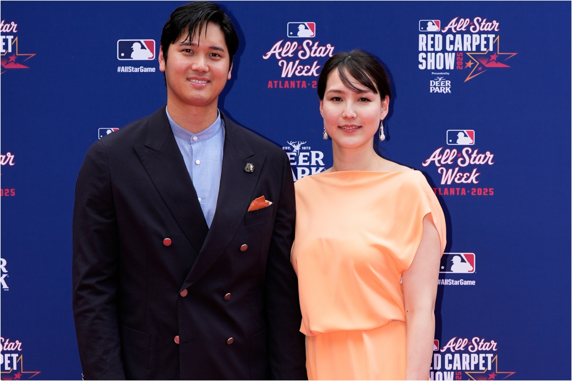 Los Angeles Dodgers' Shohei Ohtani arrives with his wife Mamiko Tanaka.