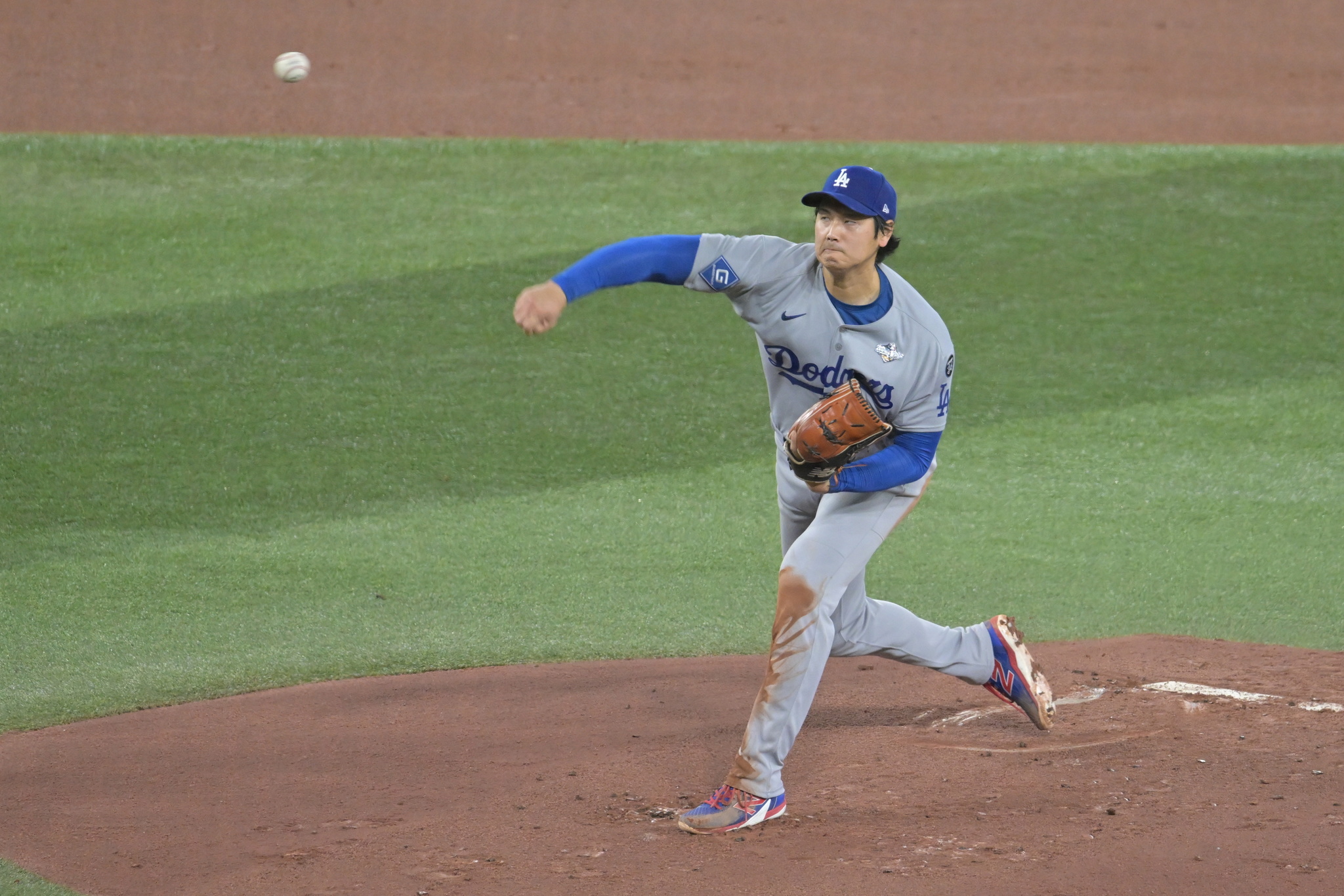 Los Angeles Dodgers two-way player Shohei Ohtan relases a pitch against a Toronto Blue Jays