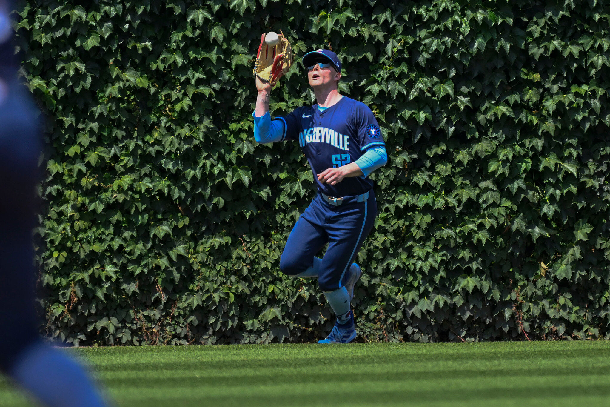 Pete Crow-Armstrong catches a fly ball hit by Corbin Carroll during the fifth inning of a baseball game