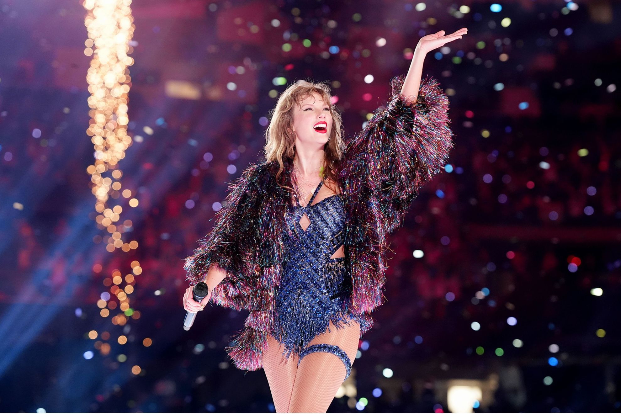 Taylor Swift waves to the crowd in New Orleans in October 2024.