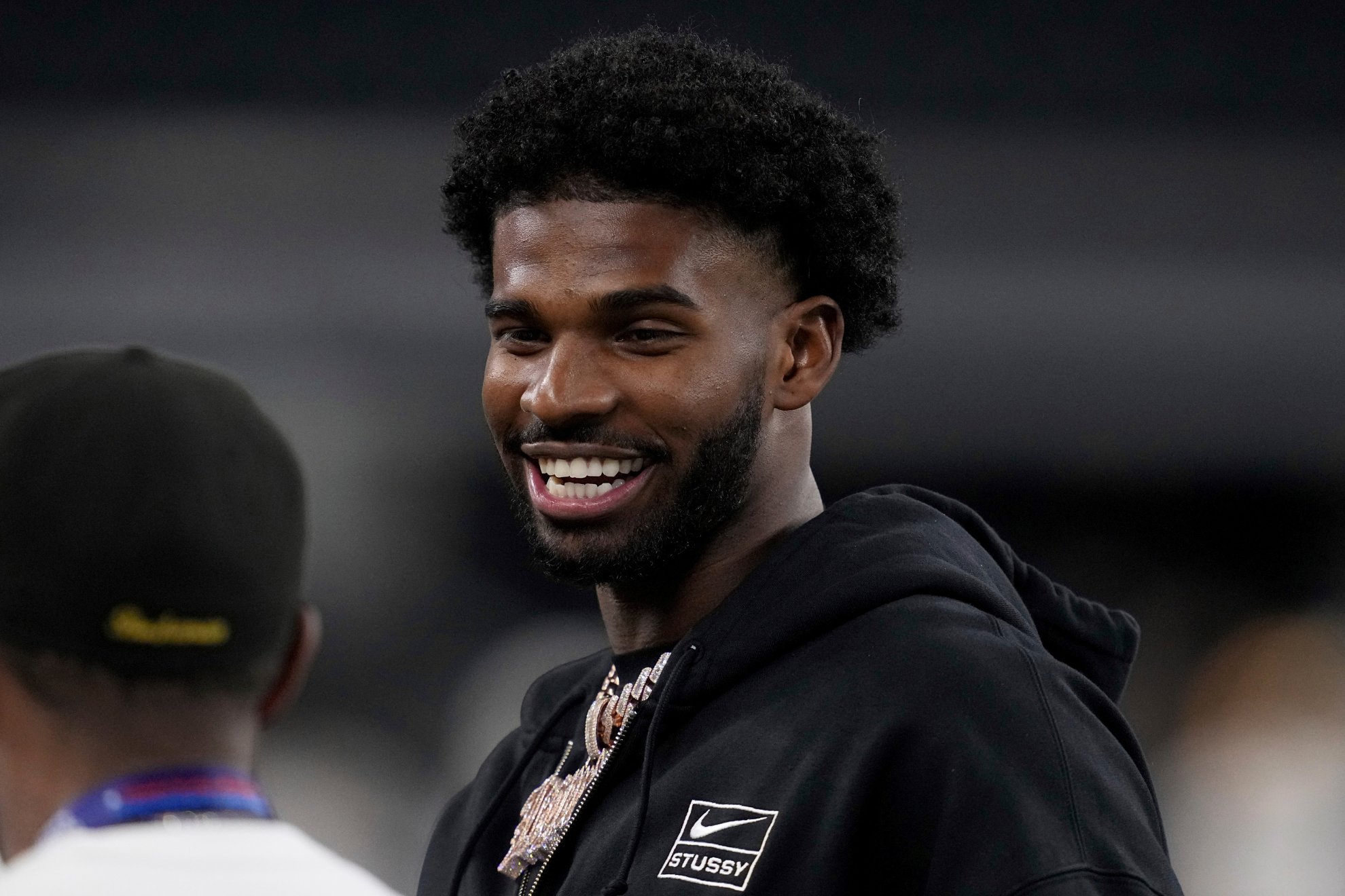 Shedeur Sanders watched from the sidelines during the East-West Shrine Bowl