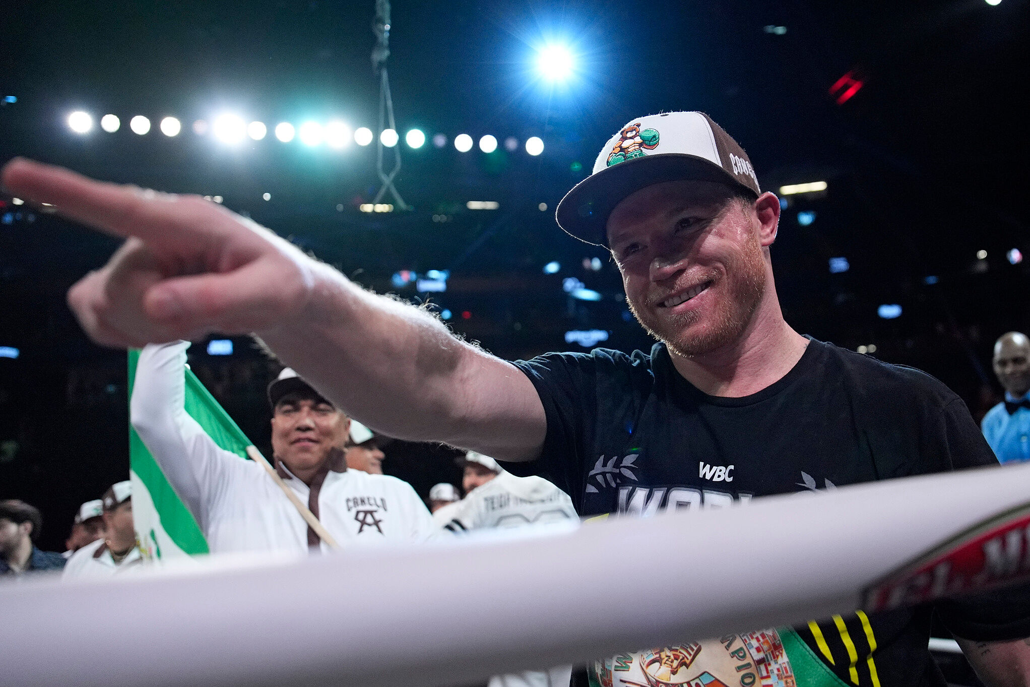 Canelo Alvarez celebrates after defeating Edgar Berlanga in a super middleweight title bout