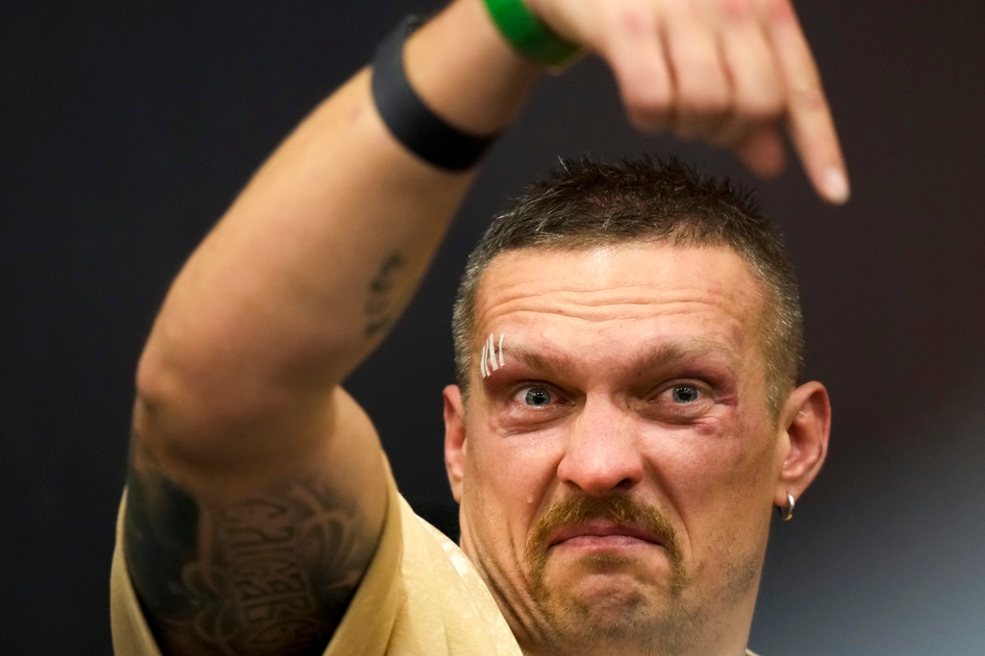 Ukraine's Oleksandr Usyk gestures.