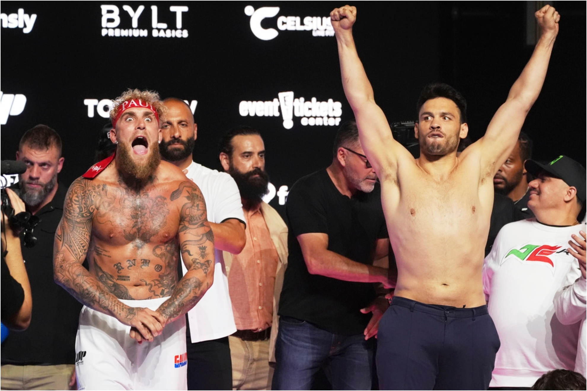 Jake Paul and JC Chavez Jr. pose for photographers following a ceremonial weigh-in ahead of their cruiserweight boxing match