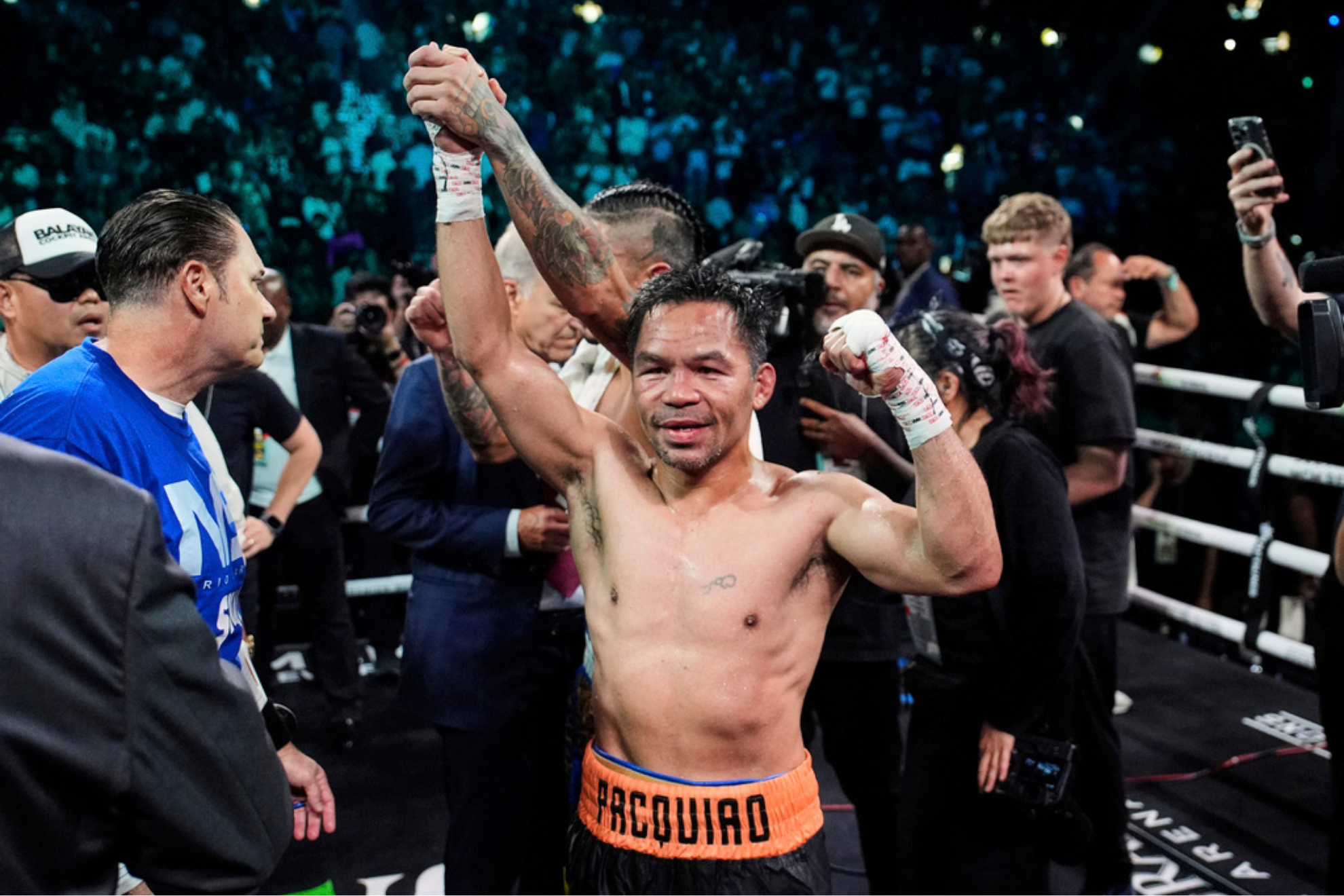 Manny Pacquiao and Mario Barrios react