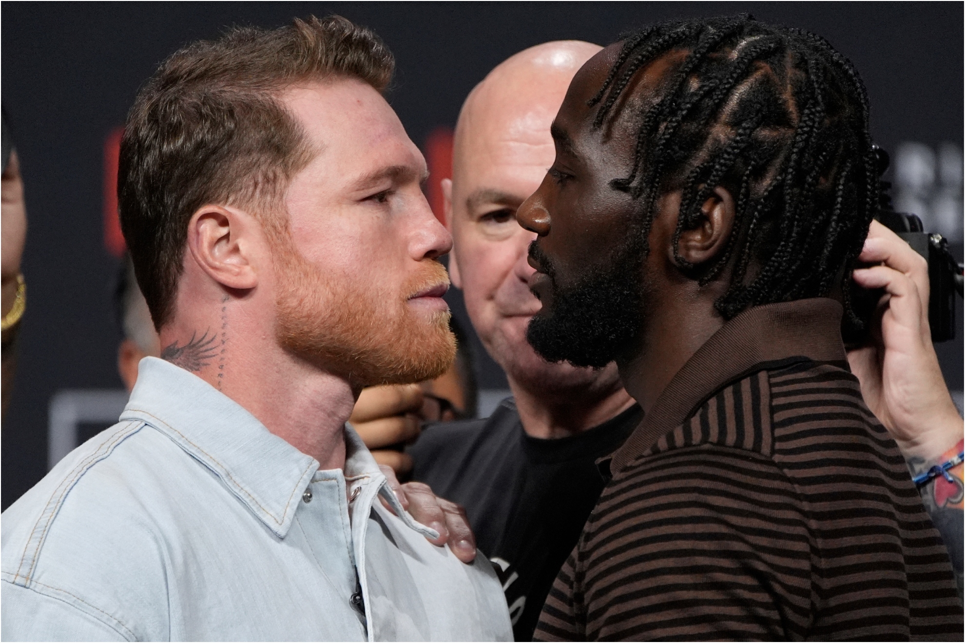 Canelo Alvarez, left, and Terence Crawford face off.