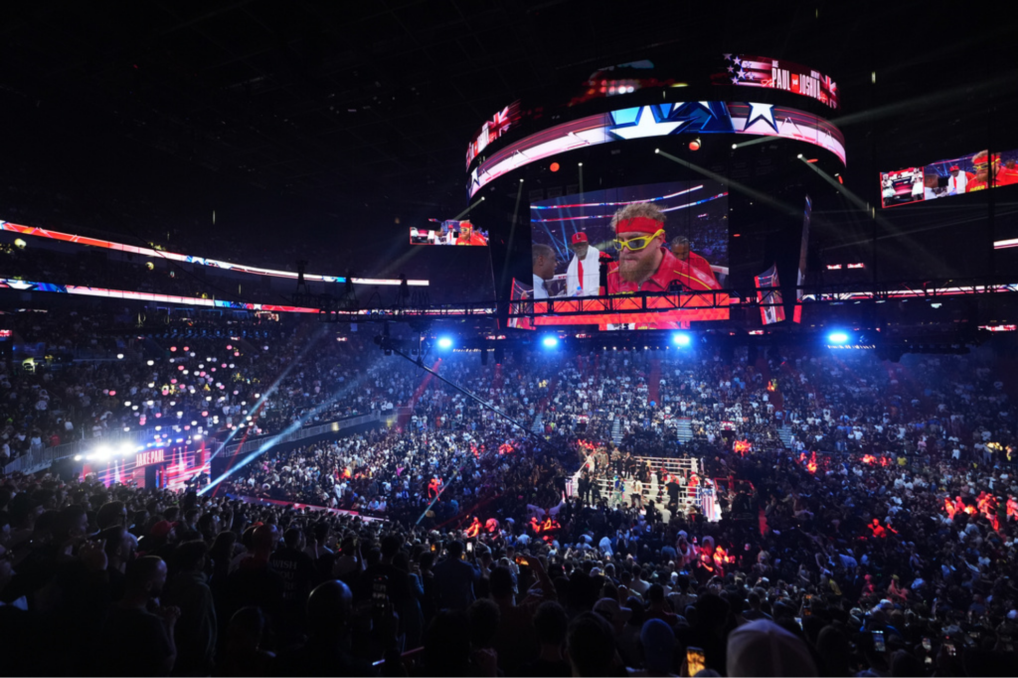 Jake Paul stands in the ring before his heavyweight boxing match against Anthony Joshua,