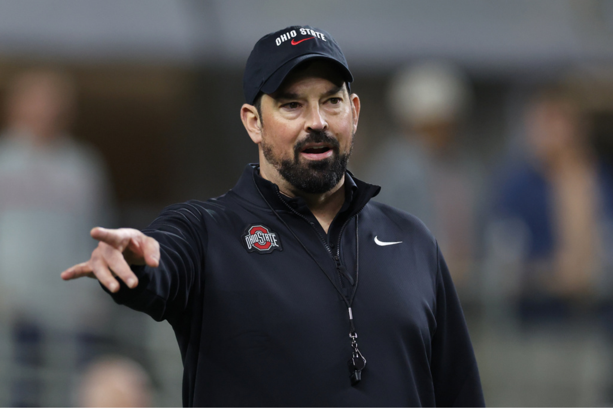 Ohio State head coach Ryan Day talks to his team prior to the Cotton Bowl College Football Playoff quarterfinal game against Miami Wednesday, Dec. 31, 2025