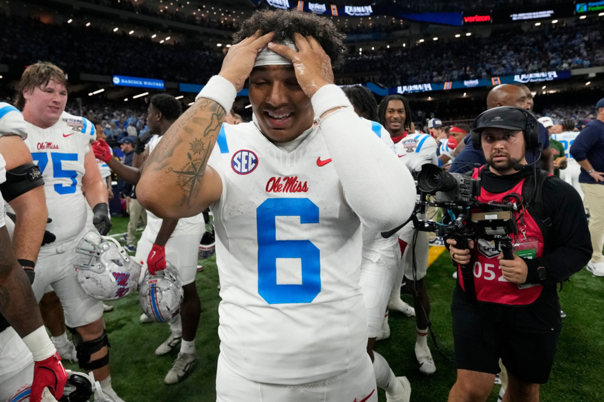 Mississippi quarterback Trinidad Chambliss (6) celebrates a win over Georgia after the Sugar Bowl
