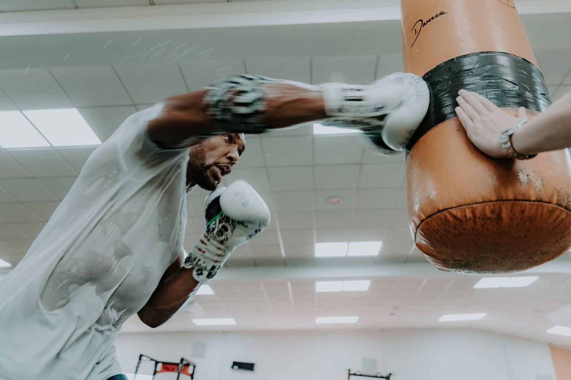 Sina and Latif were part of his inner circle, trusted figures who had supported him through his boxing career