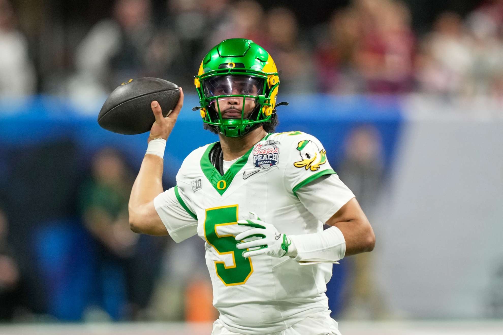 After a career year at Oregon, Dante Moore must decide between chasing a title or entering the 2026 NFL Draft.