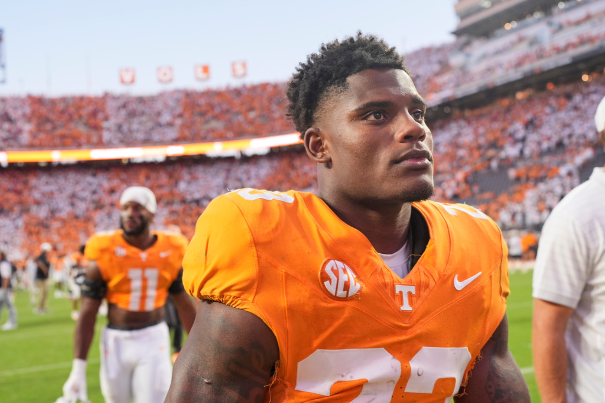 Tennessee defensive back Boo Carter (23) walks off the field after the team's overtime loss in an NCAA college football game