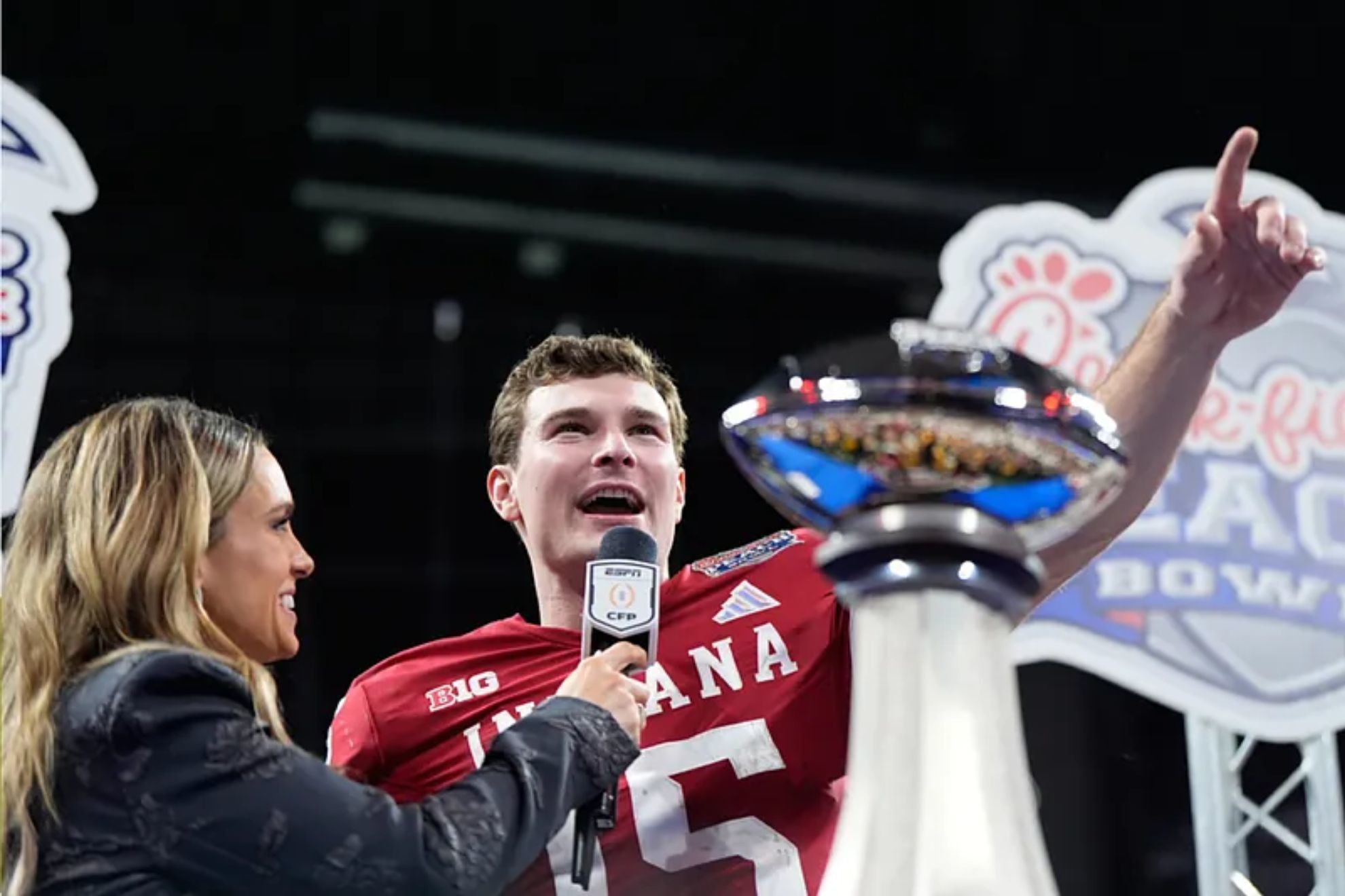 Indiana quarterback Fernando Mendoza (15) celebrates after the Peach Bowl NCAA college football playoff semifinal against Oregon