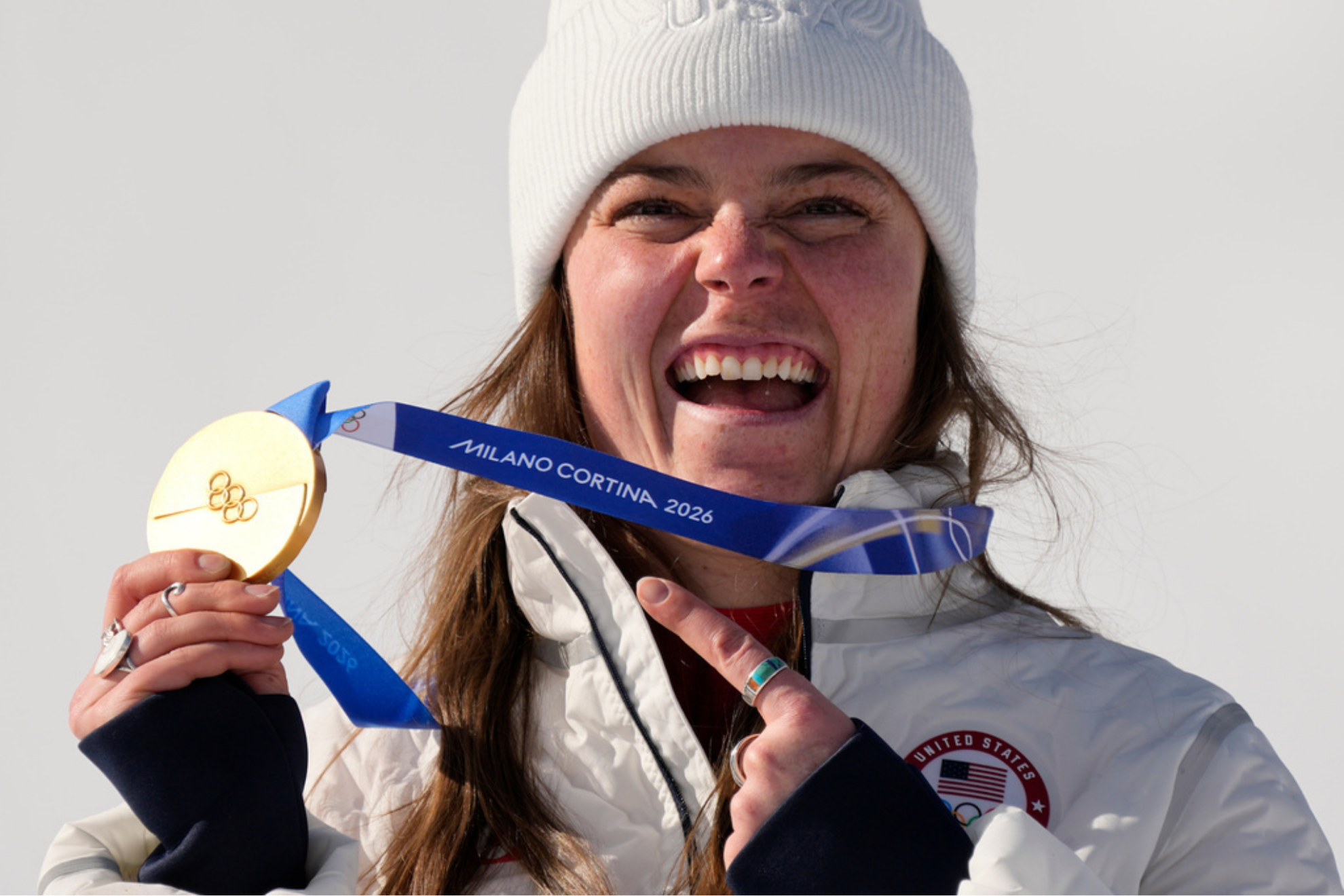 United States' Breezy Johnson shows her gold medal in the alpine ski women's downhill race