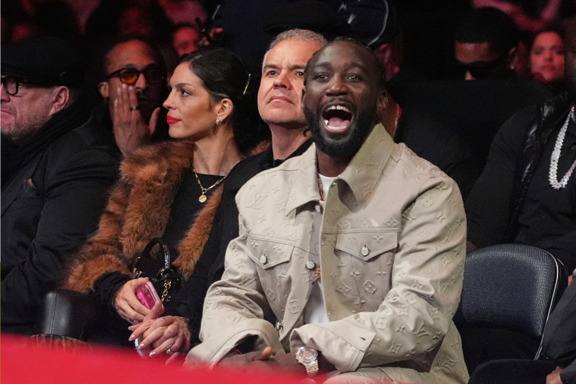 Terence Crawford reacts during a super lightweight title boxing match