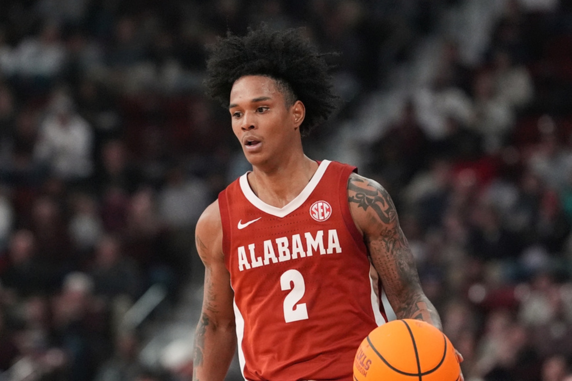 Alabama's Aden Holloway faces felony marijuana charges, suspended from the team.