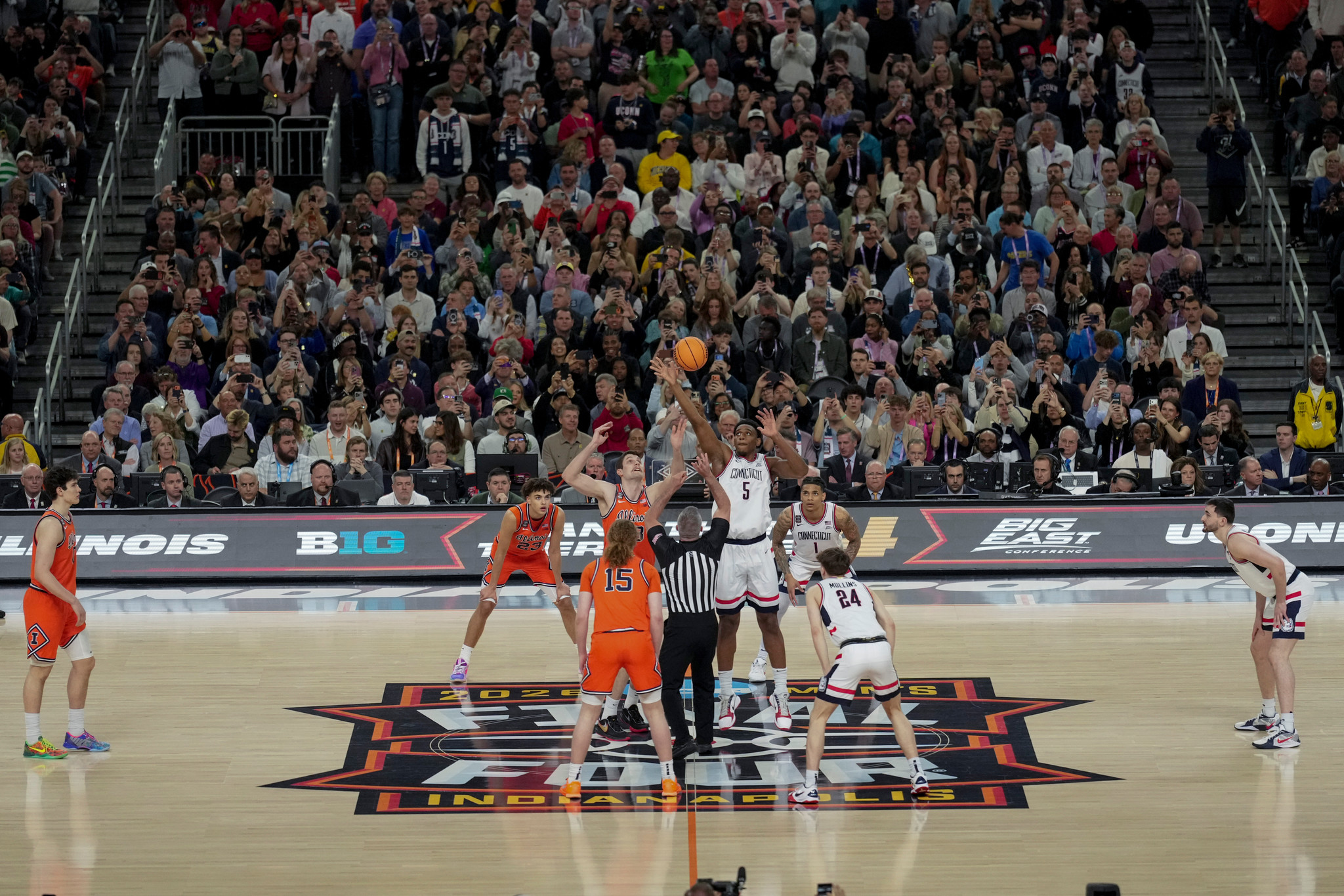UConn and Illinois begin the first half of an NCAA college basketball tournament semifinal game at the Final Four