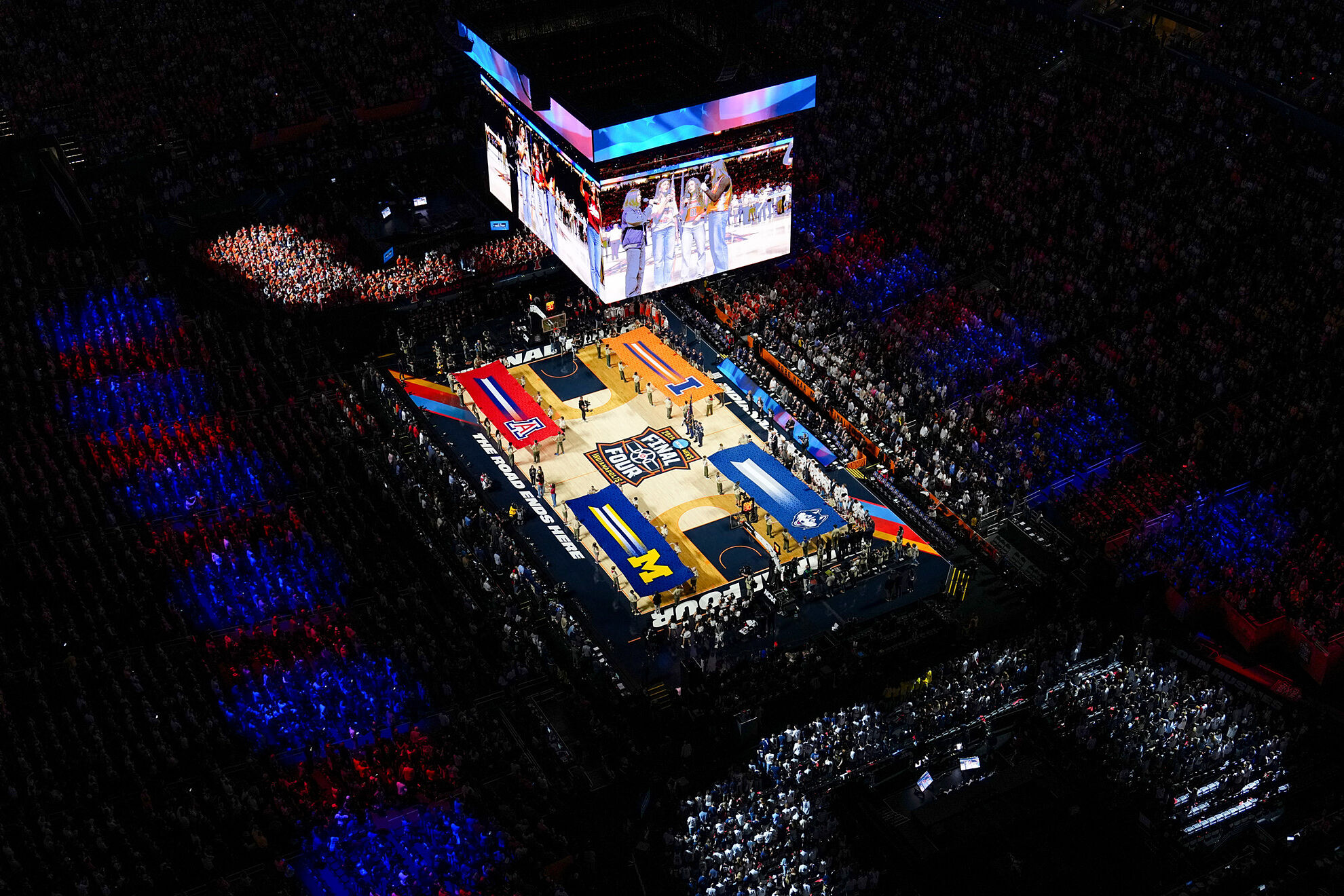 The Final Four school flags are displayed during the national anthem prior to an NCAA college basketball tournament semifinal game between Illinois and UConn at the Final Four, Saturday, April 4, 2026, in Indianapolis