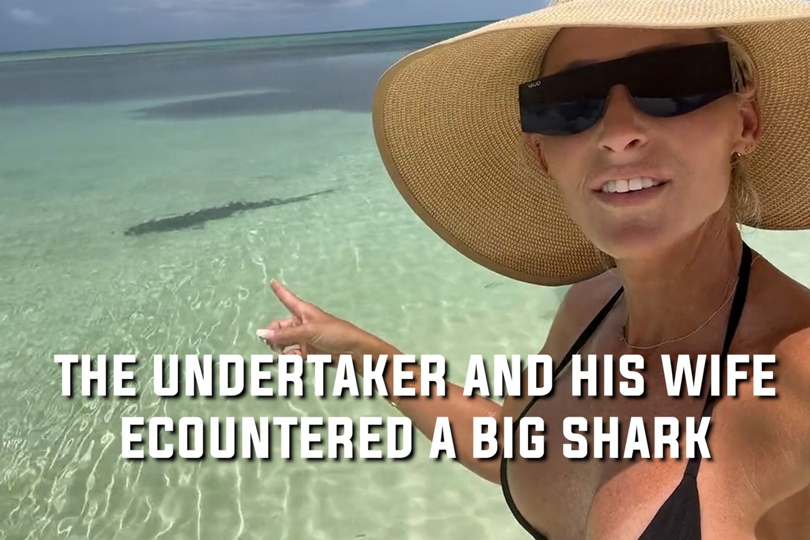 WWE legend 'The Undertaker' stares down shark to scare it away from his wife
