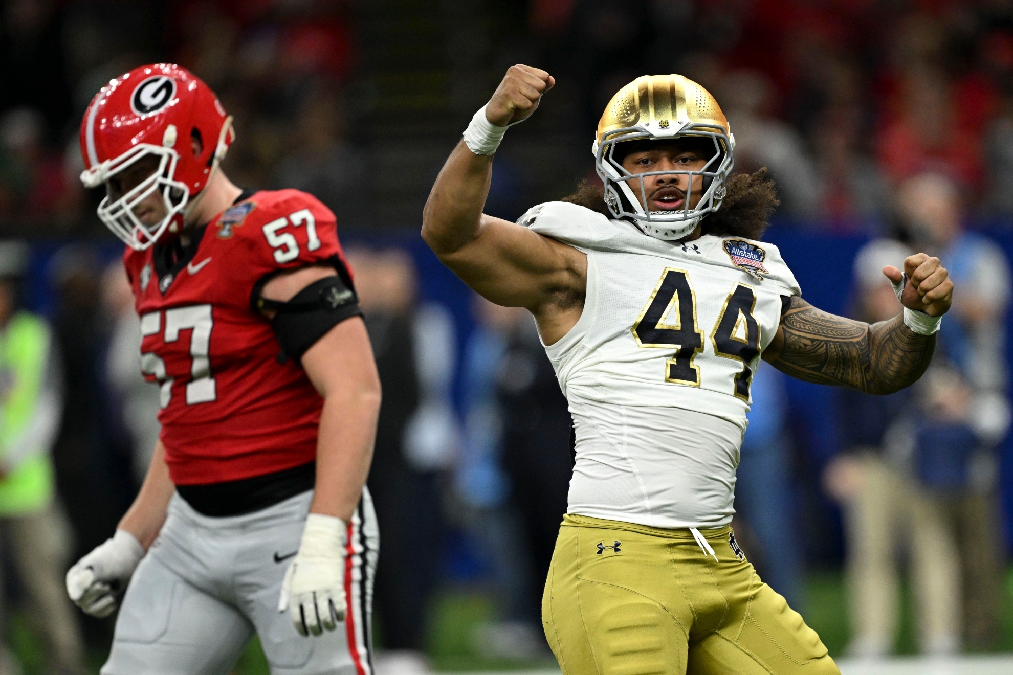 Notre Dame defensive lineman Junior Tuihalamaka celebrates after a sack during the first half against Georgia.