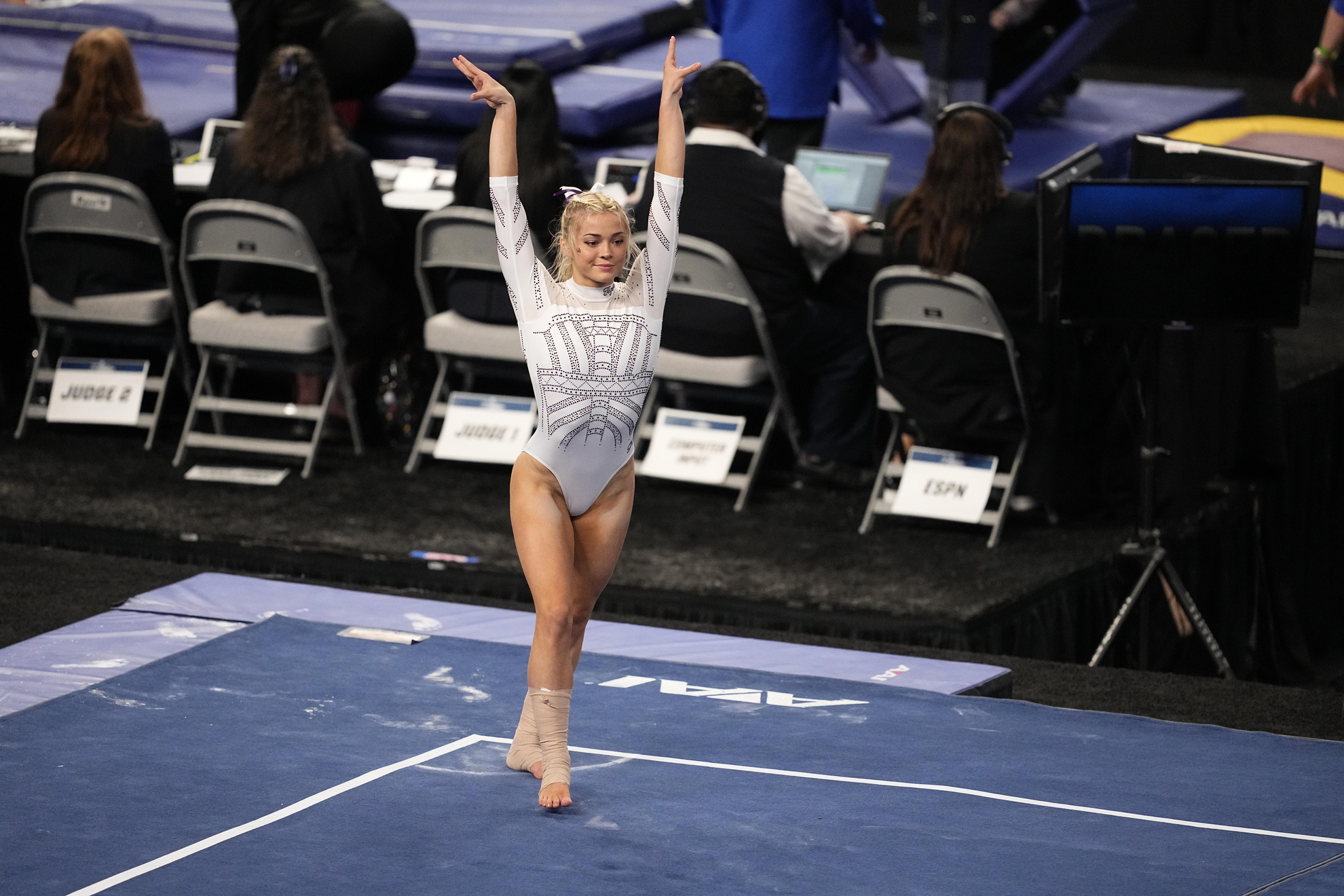 LSU's Olivia Dunne warms up on the floor exercise