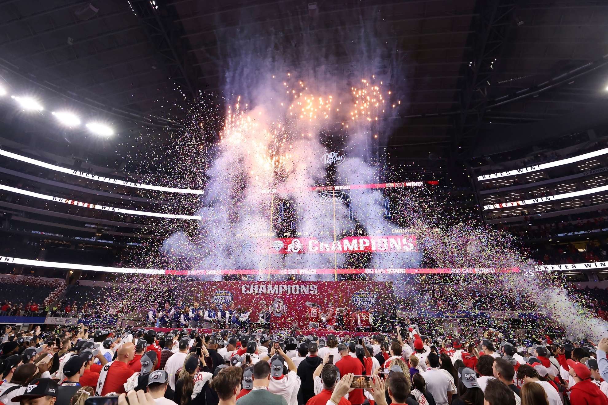 People celebrate after Ohio State defeated Texas in the Cotton Bowl College Football Playoff semifinal game.
