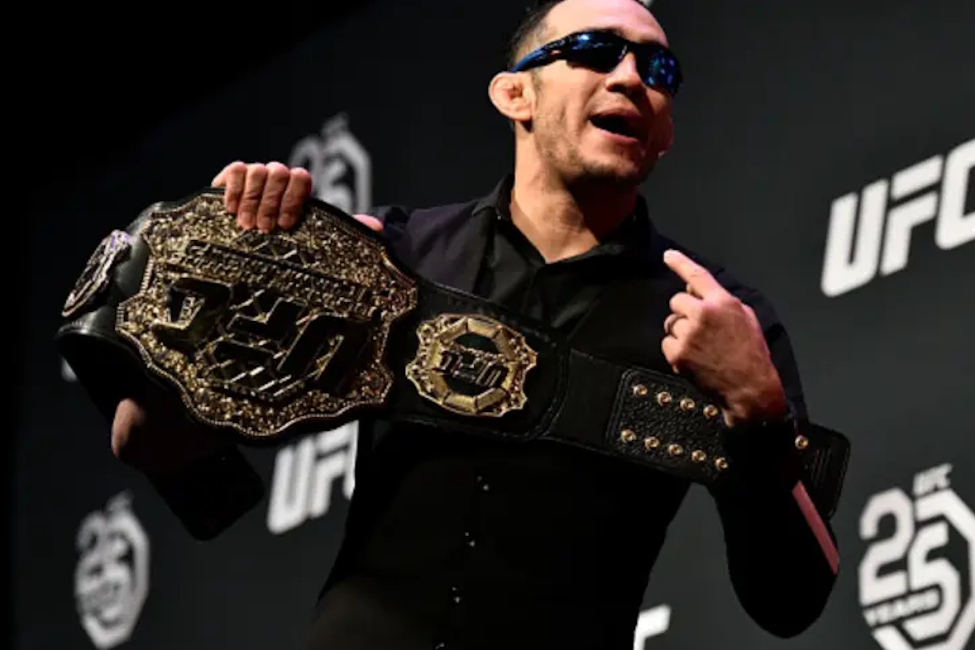 Tony Ferguson with the UFC championship belt.