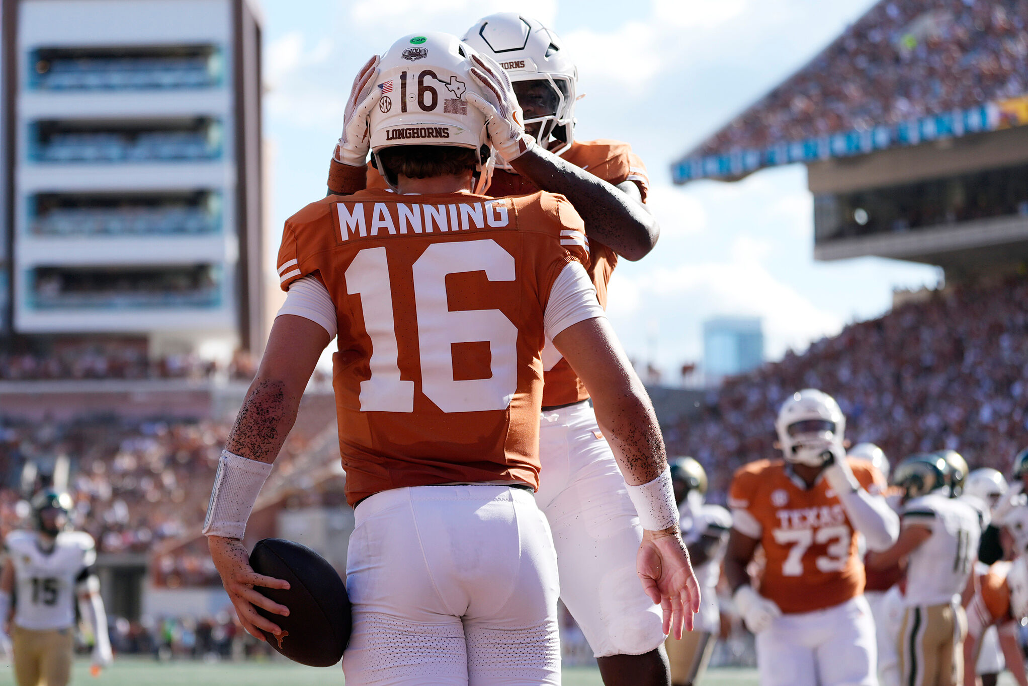 Texas quarterback Arch Manning (16) celebrates after scoring a touchdown against Colorado State