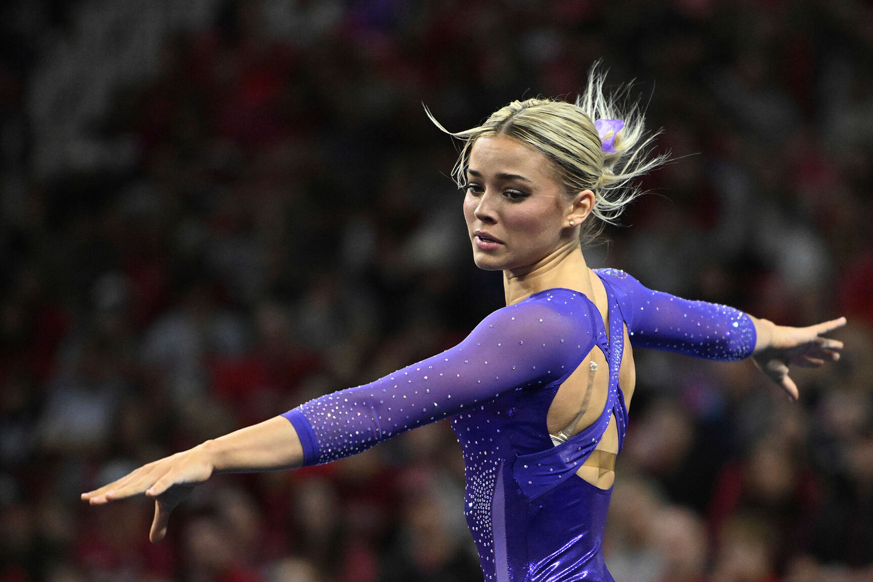 LSU gymnast Olivia Dunne competes on the floor against Arkansas during an NCAA gymnastics meet
