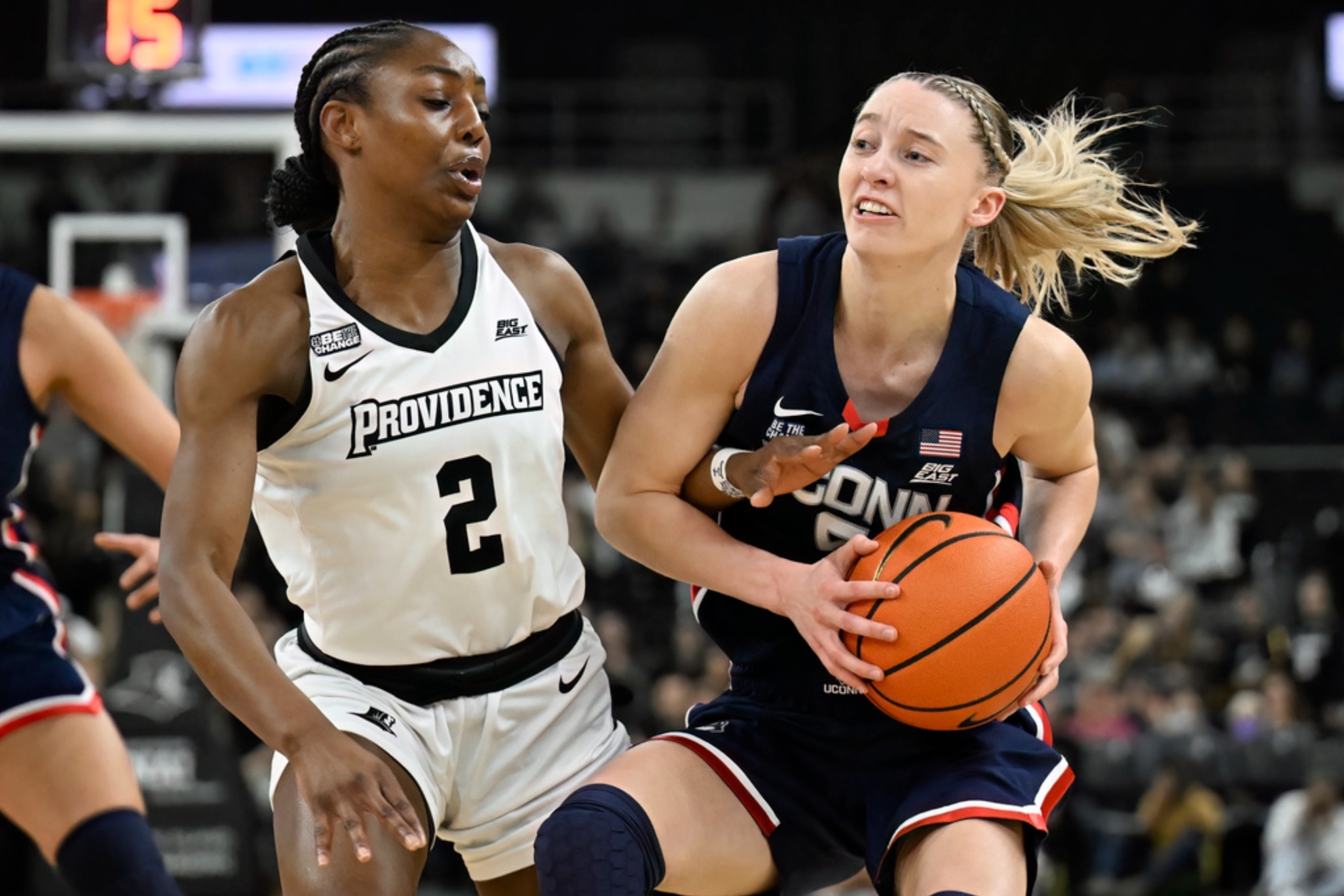 UConn's Paige Bueckers and Providence guard Grace Efosa on Sunday, Feb. 9, 2025, in Providence, R.I.