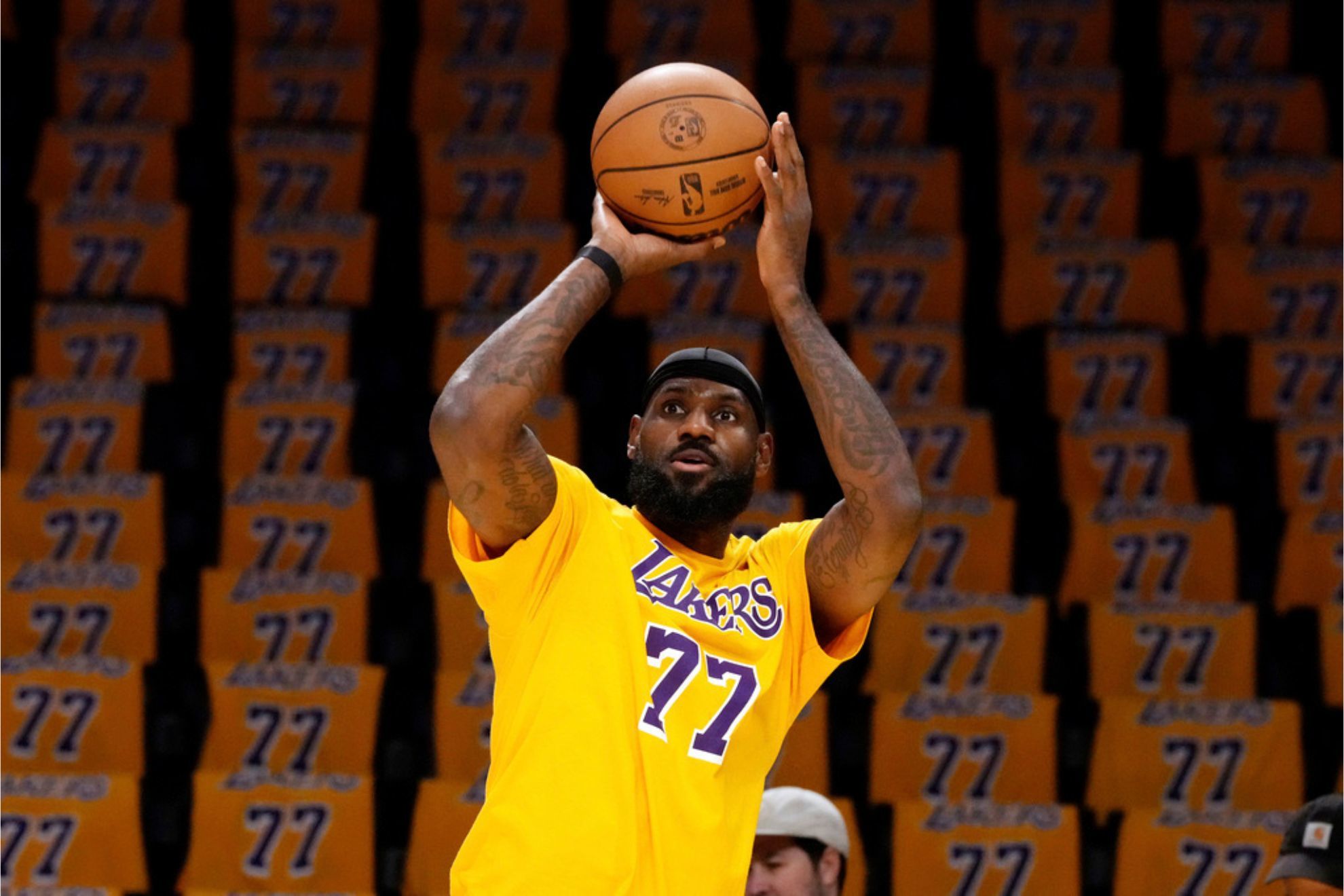 Lebron James is honored by an NBA referee as she imitates this