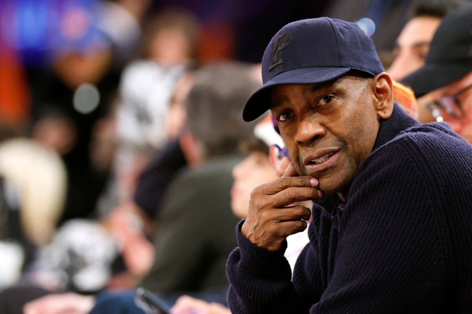 Actor Denzel Washington, courtside during the first half of an NBA basketball game between the Boston Celtics and the New York Knicks, Saturday, Feb. 8, 2025, in New York. (AP Photo/Noah K. Murray)