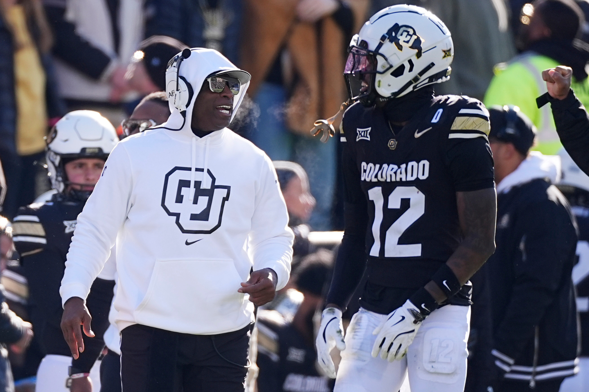Deion Sander and Travis Hunter during a Colorado Buffaloes game in 2024.