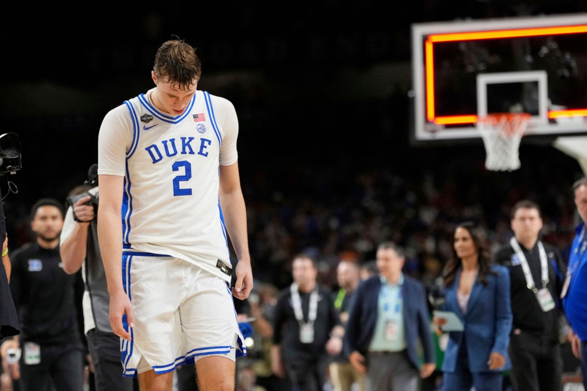 Duke's Cooper Flagg walks off the court after Duke lost to Houston in the national semifinals at the Final Four of the NCAA college basketball tournament, Saturday, April 5, 2025, in San Antonio. (AP Photo/Eric Gay)