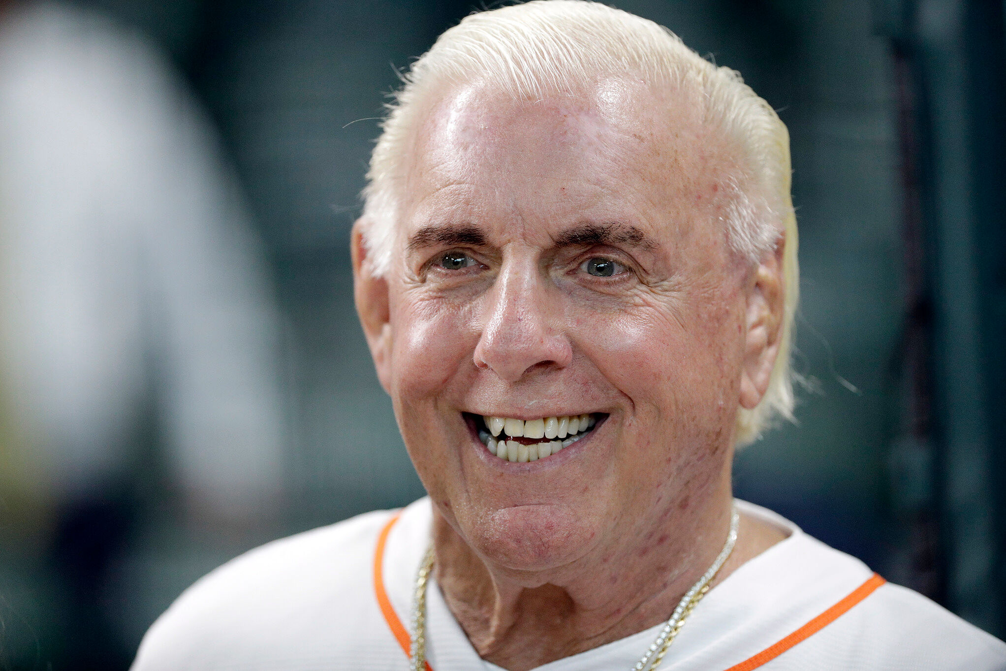 Former professional wrestler Ric Flair waits to throw out the ceremonial first pitch before a baseball game between the Detroit Tigers and Houston Astros