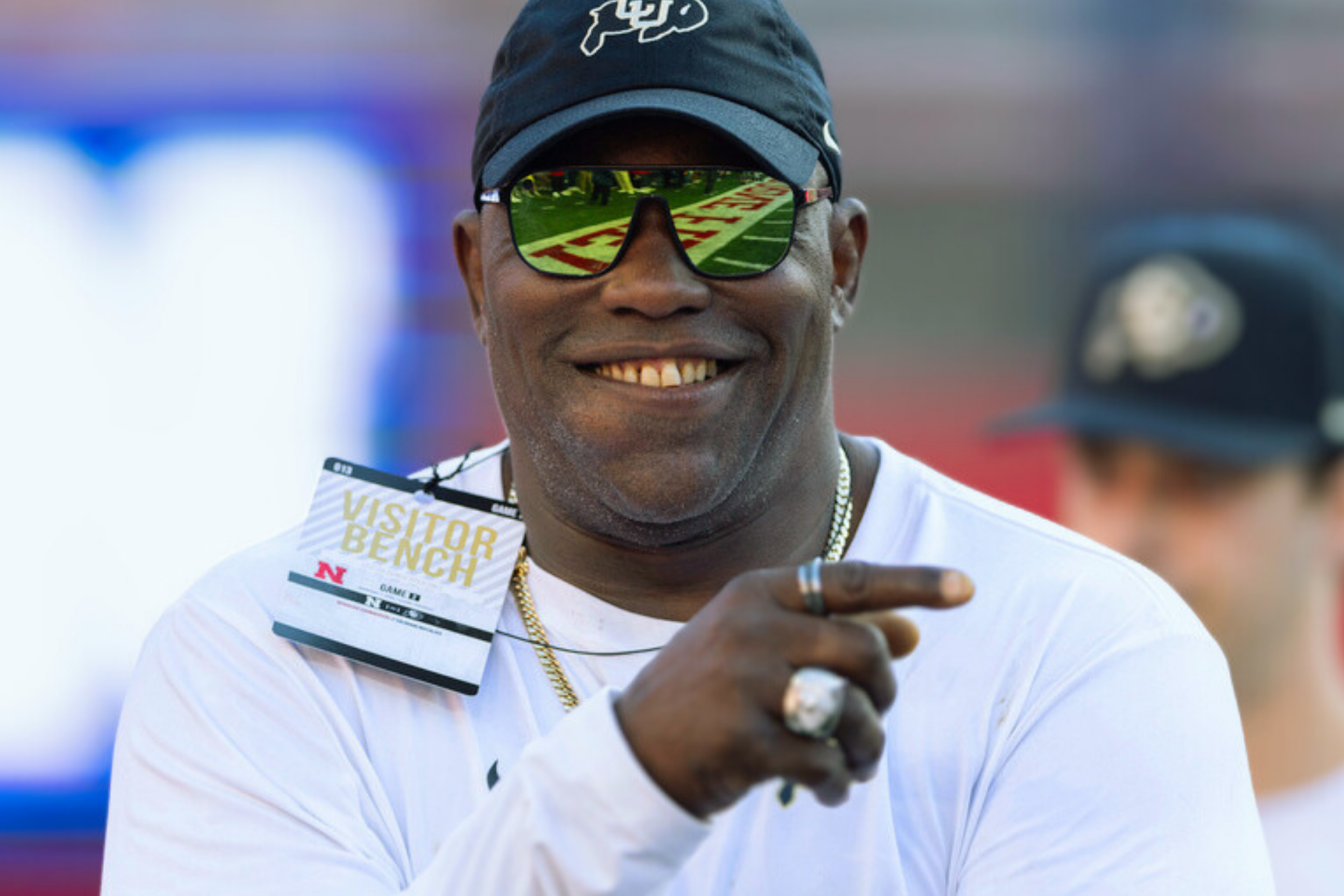 Colorado senior quality control analyst Warren Sapp walks around during warmups before his team plays against Nebraska in an NCAA college football game.