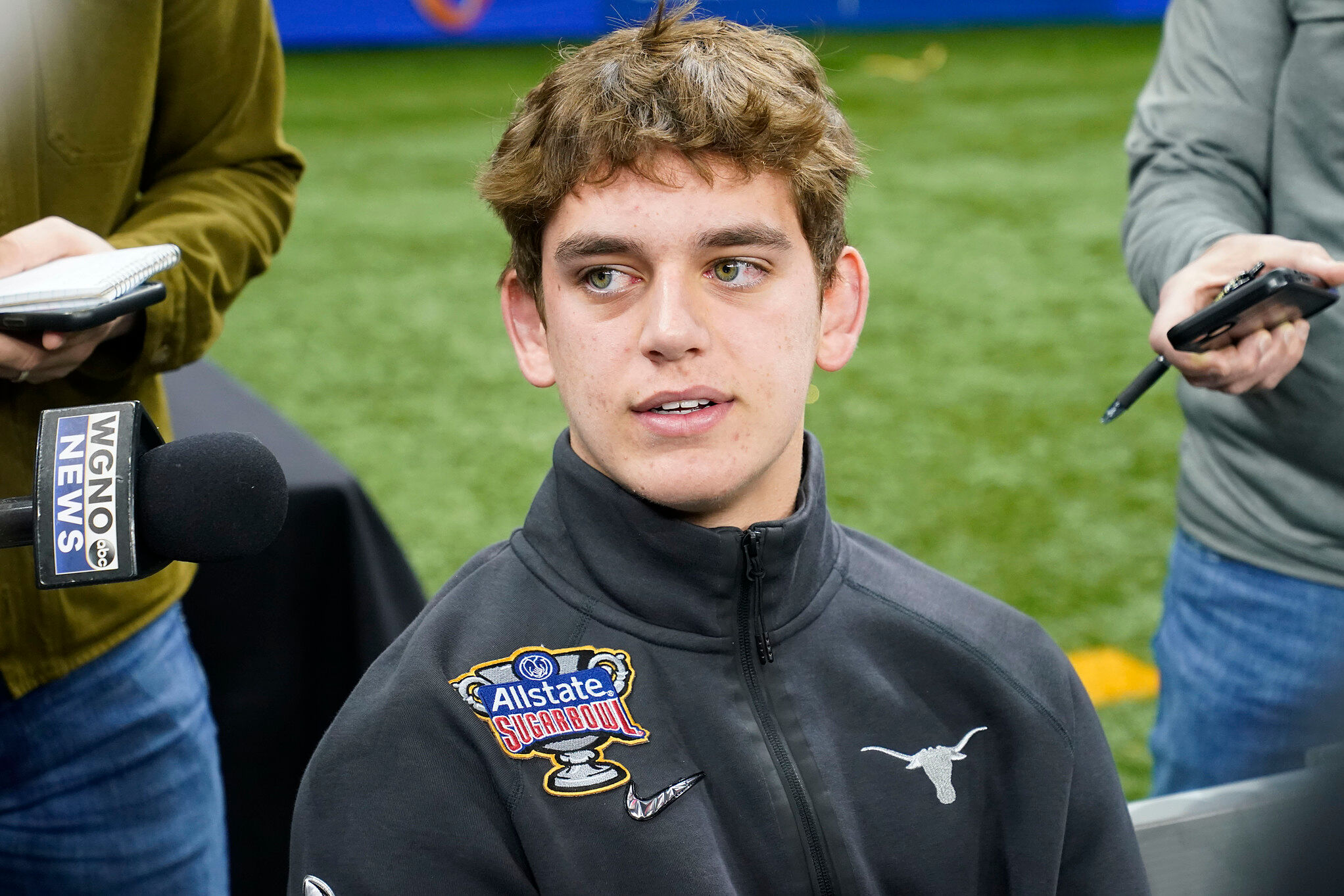 exas quarterback Arch Manning talks to reporters during media day for the the Sugar Bowl NCAA college football semifinal