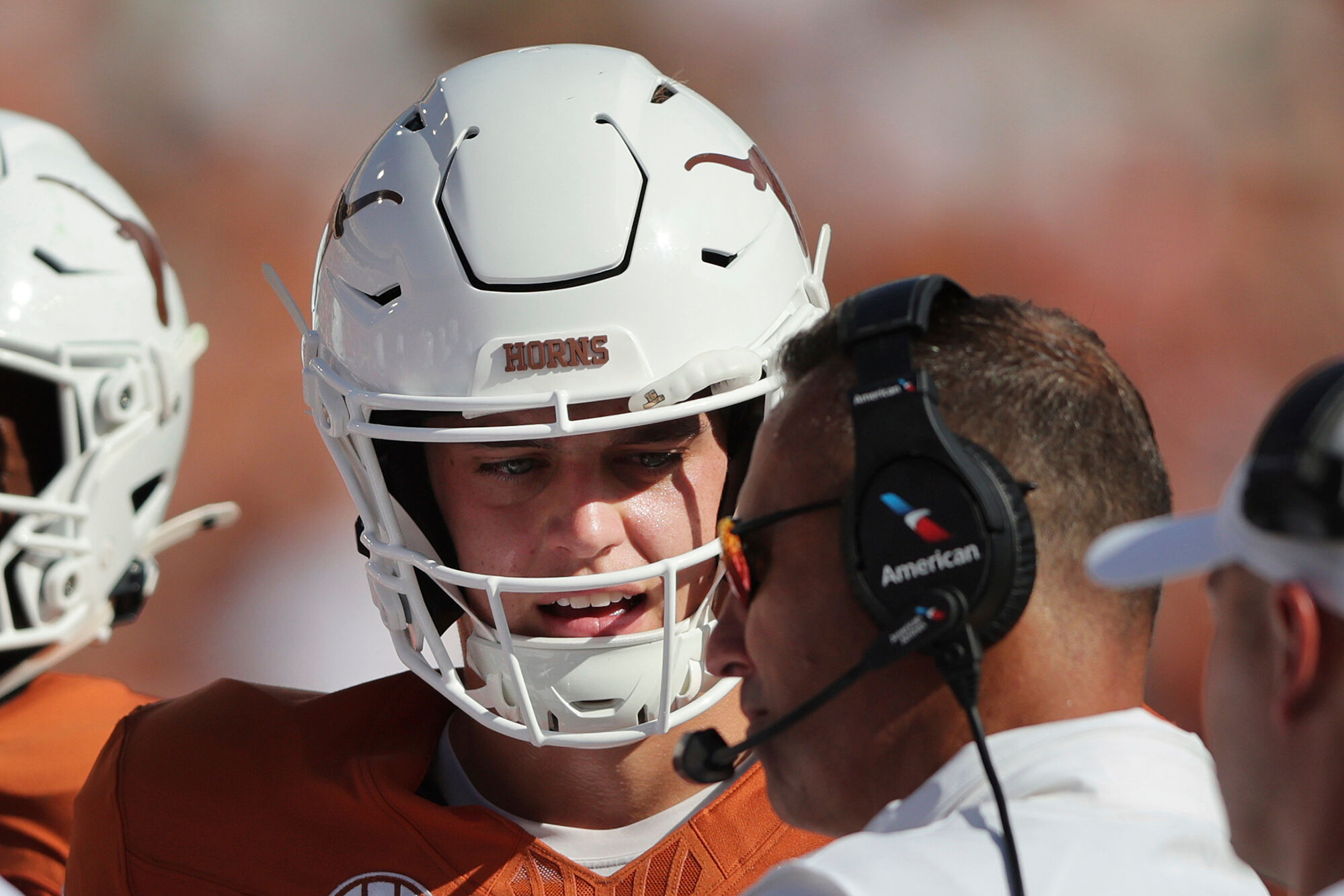 Texas quarterback Arch Manning (16) speaks with head coach Steve Sarkisian as they compete against Colorado State
