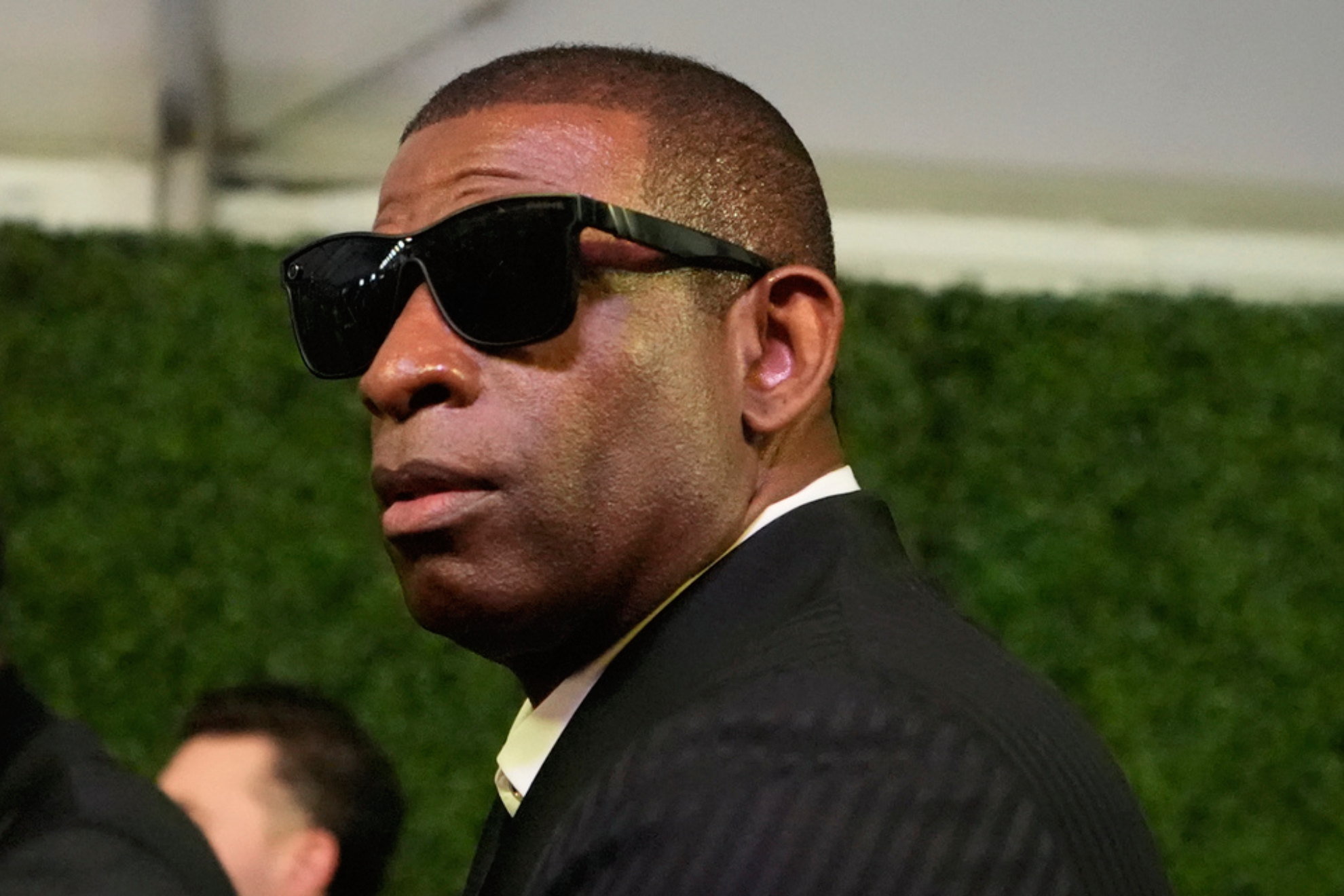 Former NFL player Deion Sanders walks the red carpet at the NFL Honors award show ahead of the Super Bowl 59 football game, Thursday, Feb. 6, 2025, in New Orleans. (AP Photo/Brynn Anderson)